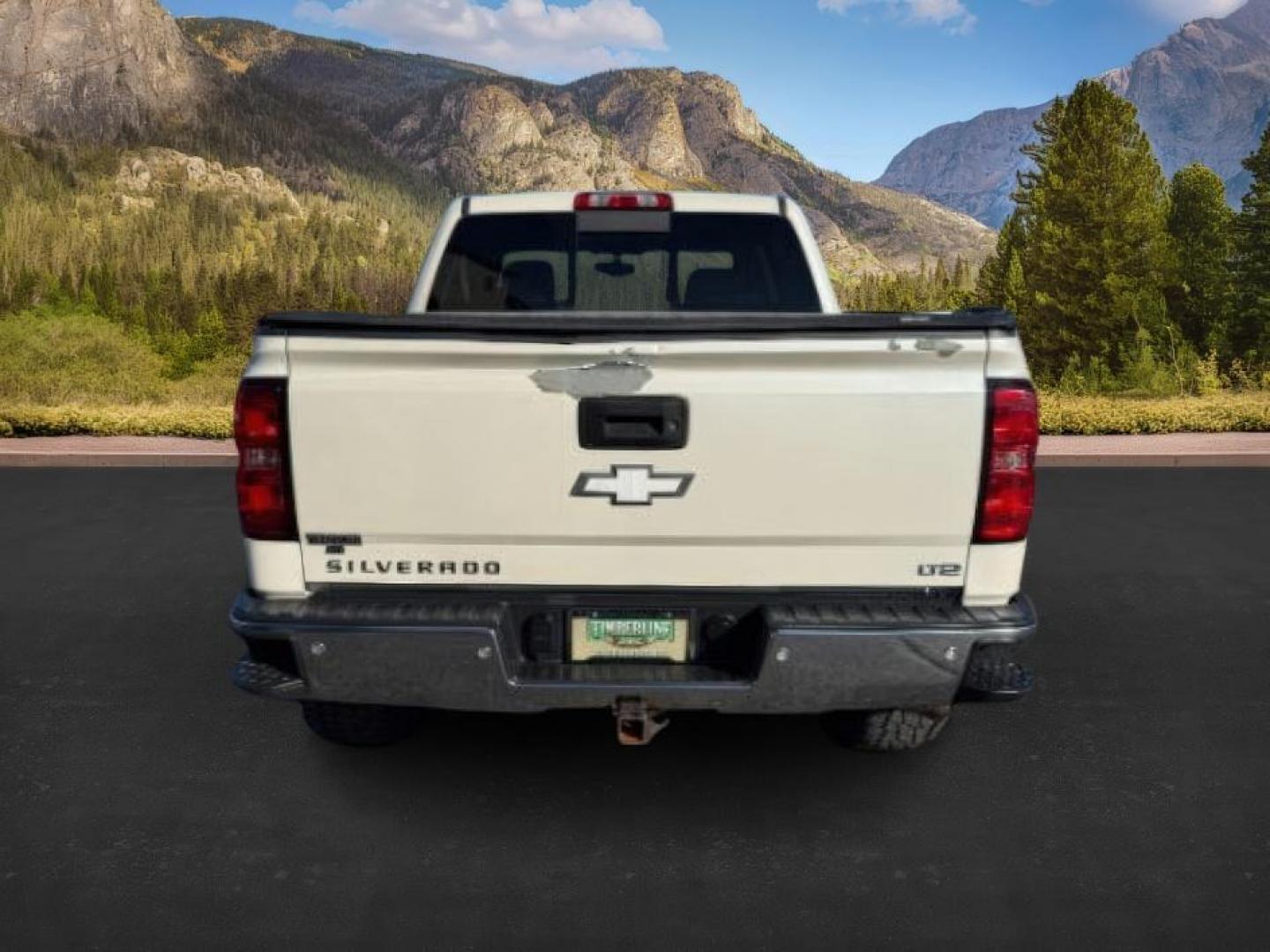 2014 WHITE /Jet Black Chevrolet Silverado 1500 (3GCUKREC8EG) with an EcoTec3 53L V-8 gasoline direct injection engine, Automatic transmission, located at 1175 N Woodruff Ave, Idaho Falls, ID, 83401, 43.506901, -111.999657 - At Timberline Auto, finding a great deal on your next vehicle is always easy! Our experienced sales staff's goal is to help find you the right vehicle at the right price! Our knowledgeable finance department has options for almost any credit score. We offer extended service contract options to prote - Photo#3