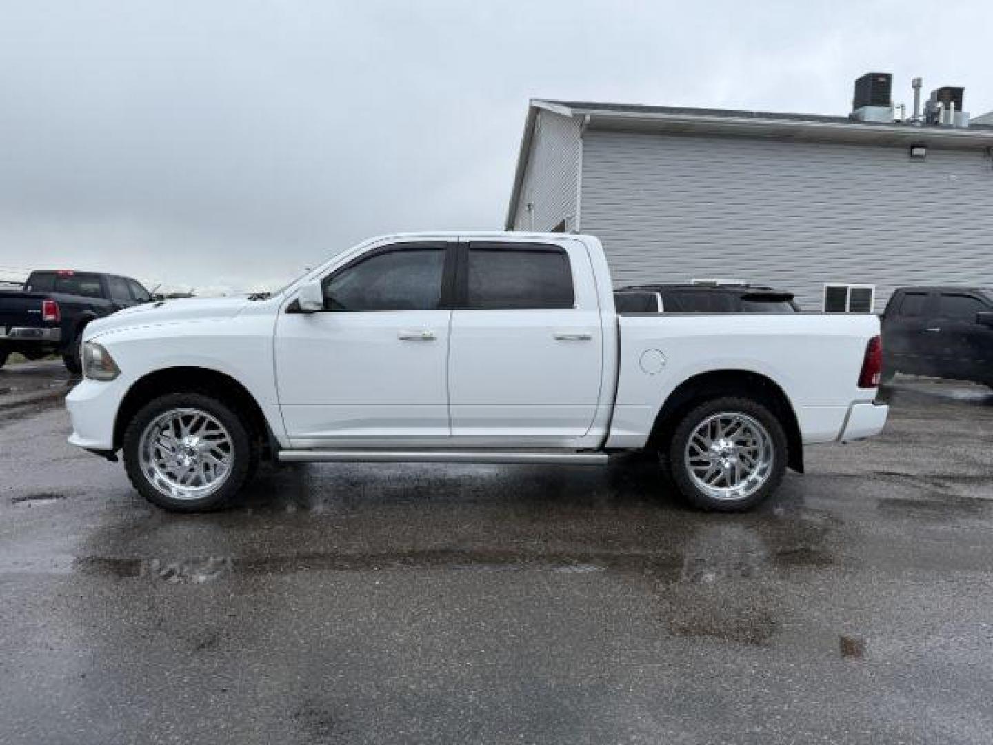 2014 WHITE /LEATHER RAM 1500 SPORT LARAMIE SPORT (1C6RR7MTXES) with an 5.7 engine, AUTOMATIC transmission, located at 1235 N Woodruff Ave., Idaho Falls, 83401, (208) 523-1053, 43.507172, -112.000488 - At Timberline Auto, finding a great deal on your next vehicle is always easy! Our experienced sales staff's goal is to help find you the right vehicle at the right price! Our knowledgeable finance department has options for almost any credit score. We offer extended service contract options to prote - Photo#1