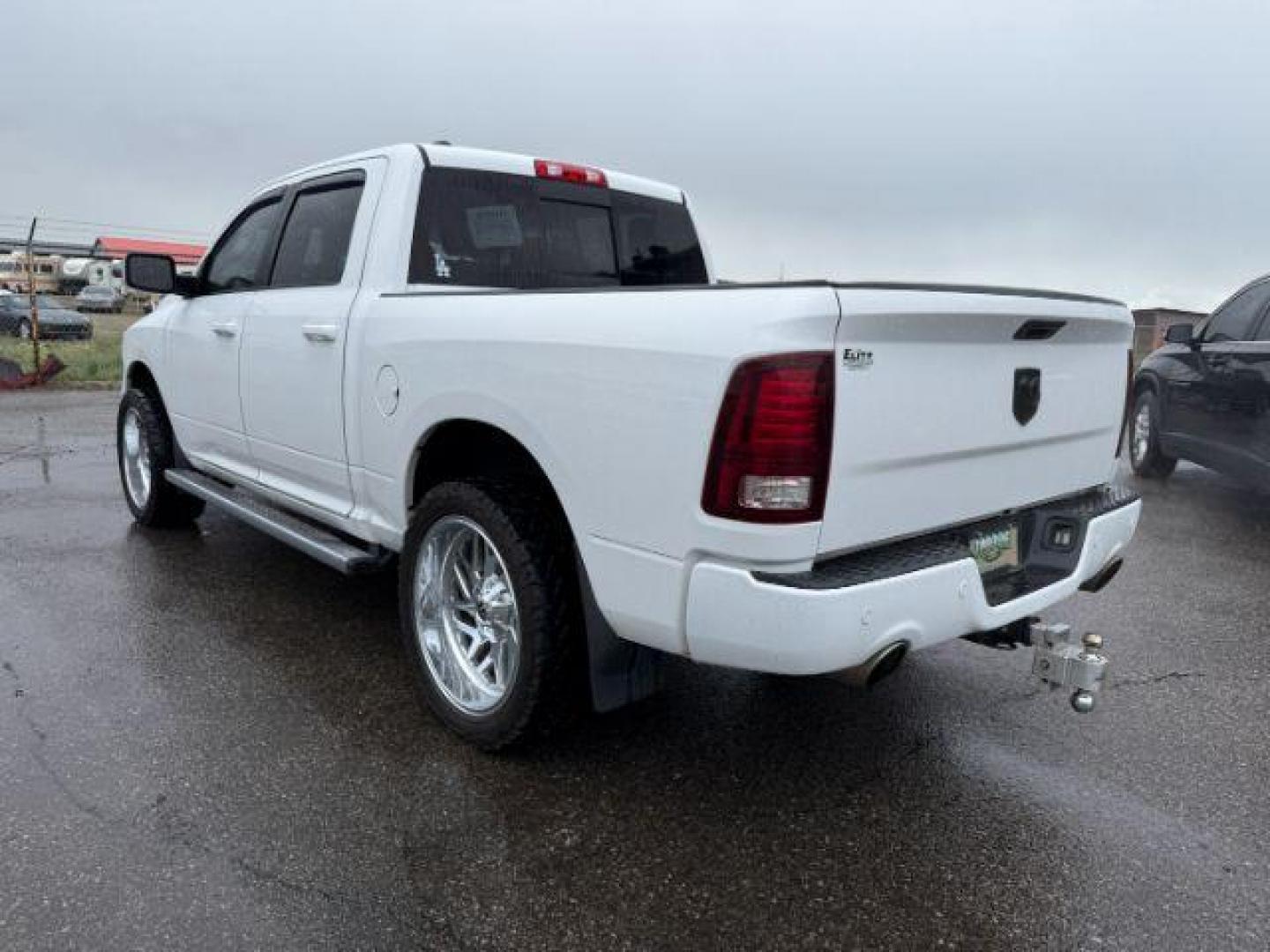 2014 WHITE /LEATHER RAM 1500 SPORT LARAMIE SPORT (1C6RR7MTXES) with an 5.7 engine, AUTOMATIC transmission, located at 1235 N Woodruff Ave., Idaho Falls, 83401, (208) 523-1053, 43.507172, -112.000488 - At Timberline Auto, finding a great deal on your next vehicle is always easy! Our experienced sales staff's goal is to help find you the right vehicle at the right price! Our knowledgeable finance department has options for almost any credit score. We offer extended service contract options to prote - Photo#2