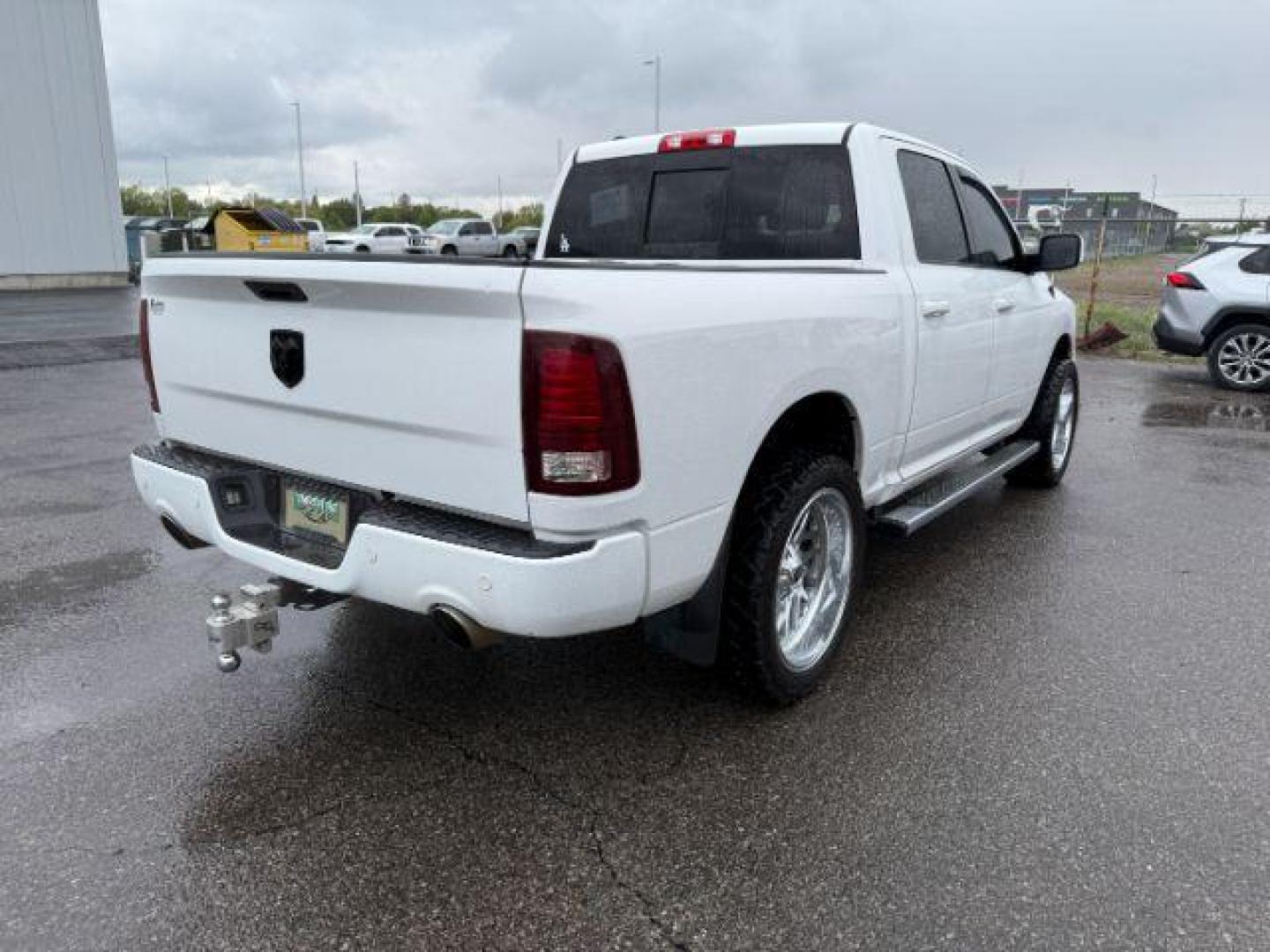 2014 WHITE /LEATHER RAM 1500 SPORT LARAMIE SPORT (1C6RR7MTXES) with an 5.7 engine, AUTOMATIC transmission, located at 1235 N Woodruff Ave., Idaho Falls, 83401, (208) 523-1053, 43.507172, -112.000488 - At Timberline Auto, finding a great deal on your next vehicle is always easy! Our experienced sales staff's goal is to help find you the right vehicle at the right price! Our knowledgeable finance department has options for almost any credit score. We offer extended service contract options to prote - Photo#4