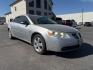 2005 GRAY /Ebony Pontiac G6 (1G2ZH528454) with an 35L V-6 regular unleaded engine, Automatic transmission, located at 1175 N Woodruff Ave, Idaho Falls, ID, 83401, 43.506901, -111.999657 - At Timberline Auto, finding a great deal on your next vehicle is always easy! Our experienced sales staff's goal is to help find you the right vehicle at the right price! Our knowledgeable finance department has options for almost any credit score. We offer extended service contract options to prote - Photo#26
