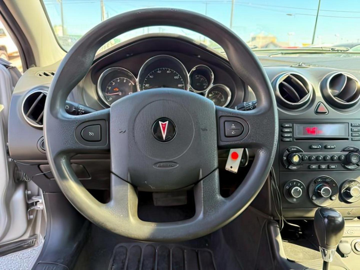 2005 GRAY /Ebony Pontiac G6 (1G2ZH528454) with an 35L V-6 regular unleaded engine, Automatic transmission, located at 1175 N Woodruff Ave, Idaho Falls, ID, 83401, 43.506901, -111.999657 - At Timberline Auto, finding a great deal on your next vehicle is always easy! Our experienced sales staff's goal is to help find you the right vehicle at the right price! Our knowledgeable finance department has options for almost any credit score. We offer extended service contract options to prote - Photo#12