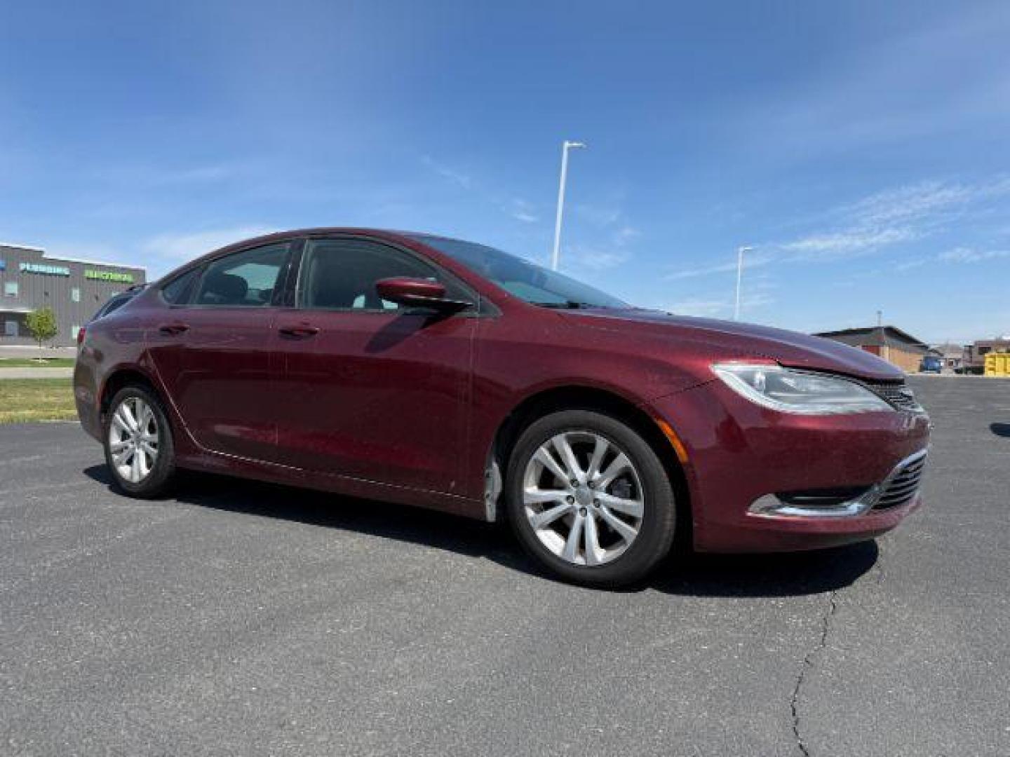 2015 Velvet Red Pearlcoat /Black Chrysler 200 Limited (1C3CCCAB0FN) with an MultiAir 2.4L I-4 variable valve control engine, AUTOMATIC transmission, located at 1235 N Woodruff Ave., Idaho Falls, 83401, (208) 523-1053, 43.507172, -112.000488 - At Timberline Auto, finding a great deal on your next vehicle is always easy! Our experienced sales staff's goal is to help find you the right vehicle at the right price! Our knowledgeable finance department has options for almost any credit score. We offer extended service contract options to prote - Photo#0