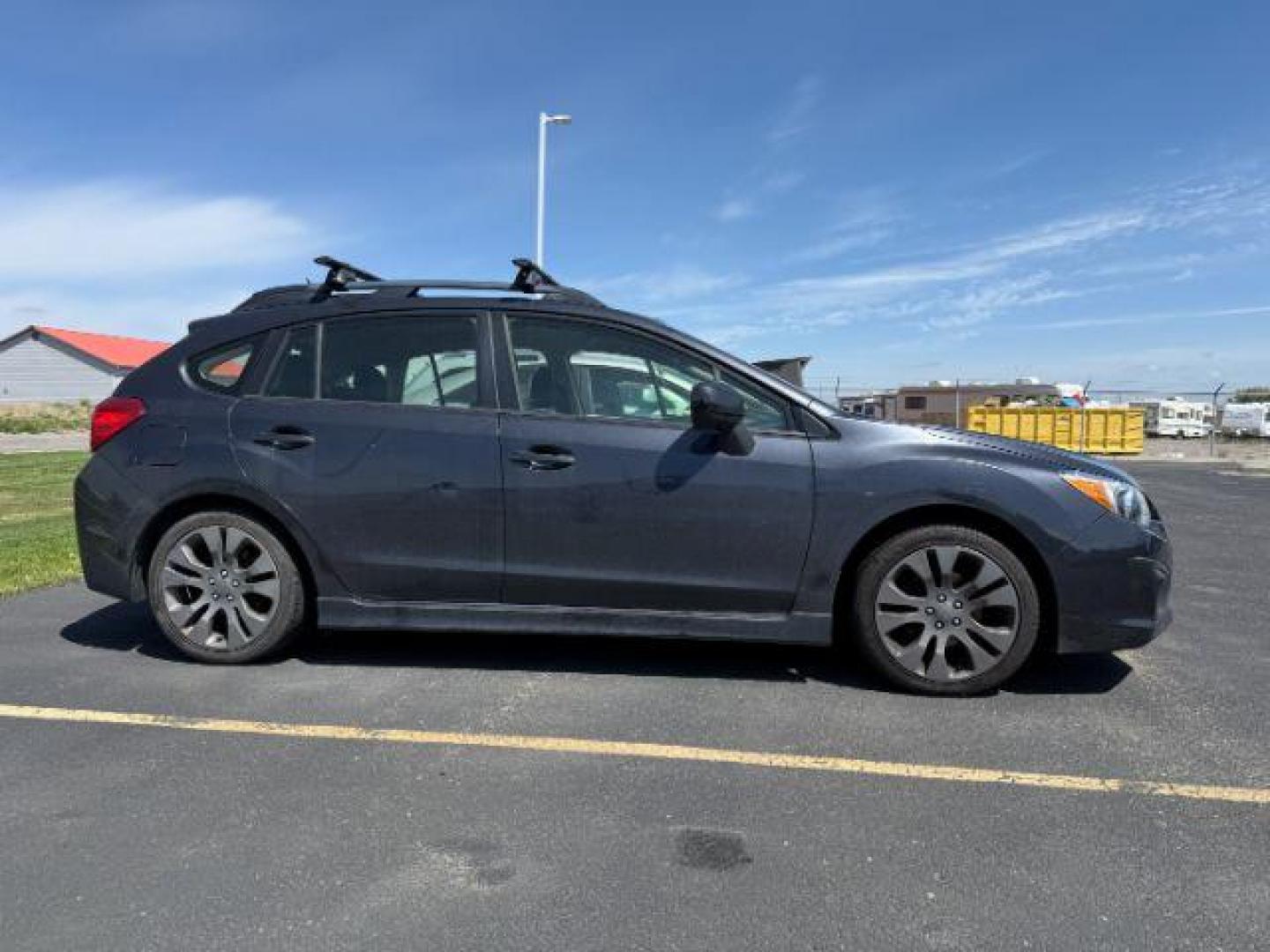 2013 Marine Blue Pearl /Black Subaru Impreza 2.0i Sport Premium (JF1GPAL63D2) with an 2L H-4 DOHC engine, AUTOMATIC transmission, located at 1235 N Woodruff Ave., Idaho Falls, 83401, (208) 523-1053, 43.507172, -112.000488 - At Timberline Auto, finding a great deal on your next vehicle is always easy! Our experienced sales staff's goal is to help find you the right vehicle at the right price! Our knowledgeable finance department has options for almost any credit score. We offer extended service contract options to prote - Photo#0