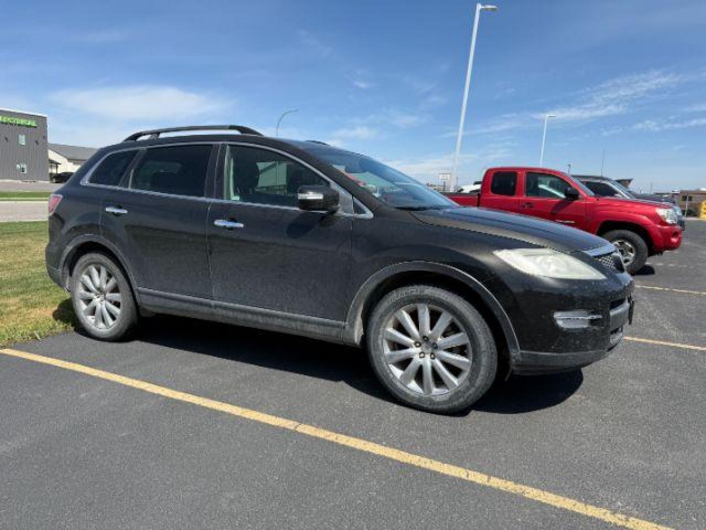 2008 Brilliant Black Clearcoat /Black Mazda CX-9 Grand Touring (JM3TB38A680) with an 3.7L V-6 DOHC engine, AUTOMATIC transmission, located at 1235 N Woodruff Ave., Idaho Falls, 83401, (208) 523-1053, 43.507172, -112.000488 - At Timberline Auto, finding a great deal on your next vehicle is always easy! Our experienced sales staff's goal is to help find you the right vehicle at the right price! Our knowledgeable finance department has options for almost any credit score. We offer extended service contract options to prote - Photo#0