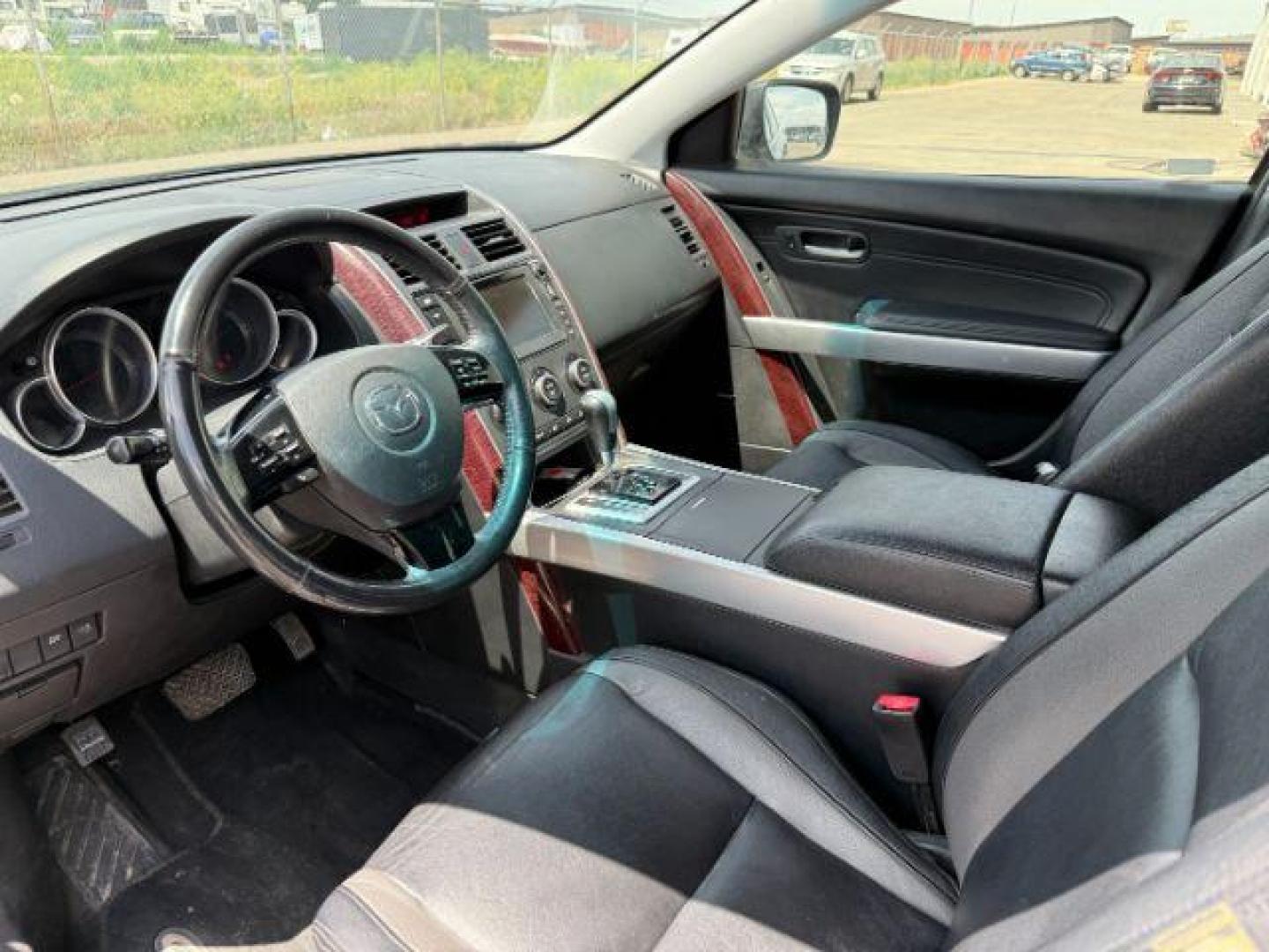 2008 Brilliant Black Clearcoat /Black Mazda CX-9 Grand Touring (JM3TB38A680) with an 3.7L V-6 DOHC engine, AUTOMATIC transmission, located at 1235 N Woodruff Ave., Idaho Falls, 83401, (208) 523-1053, 43.507172, -112.000488 - At Timberline Auto, finding a great deal on your next vehicle is always easy! Our experienced sales staff's goal is to help find you the right vehicle at the right price! Our knowledgeable finance department has options for almost any credit score. We offer extended service contract options to prote - Photo#34