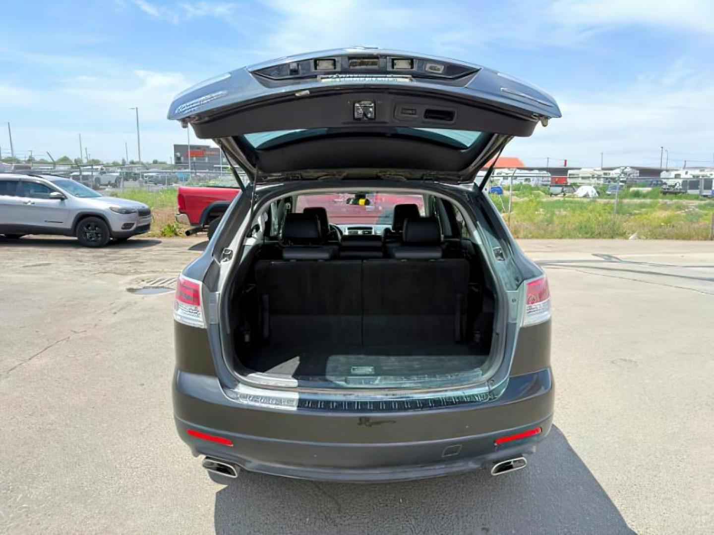 2008 Brilliant Black Clearcoat /Black Mazda CX-9 Grand Touring (JM3TB38A680) with an 3.7L V-6 DOHC engine, AUTOMATIC transmission, located at 1235 N Woodruff Ave., Idaho Falls, 83401, (208) 523-1053, 43.507172, -112.000488 - At Timberline Auto, finding a great deal on your next vehicle is always easy! Our experienced sales staff's goal is to help find you the right vehicle at the right price! Our knowledgeable finance department has options for almost any credit score. We offer extended service contract options to prote - Photo#5