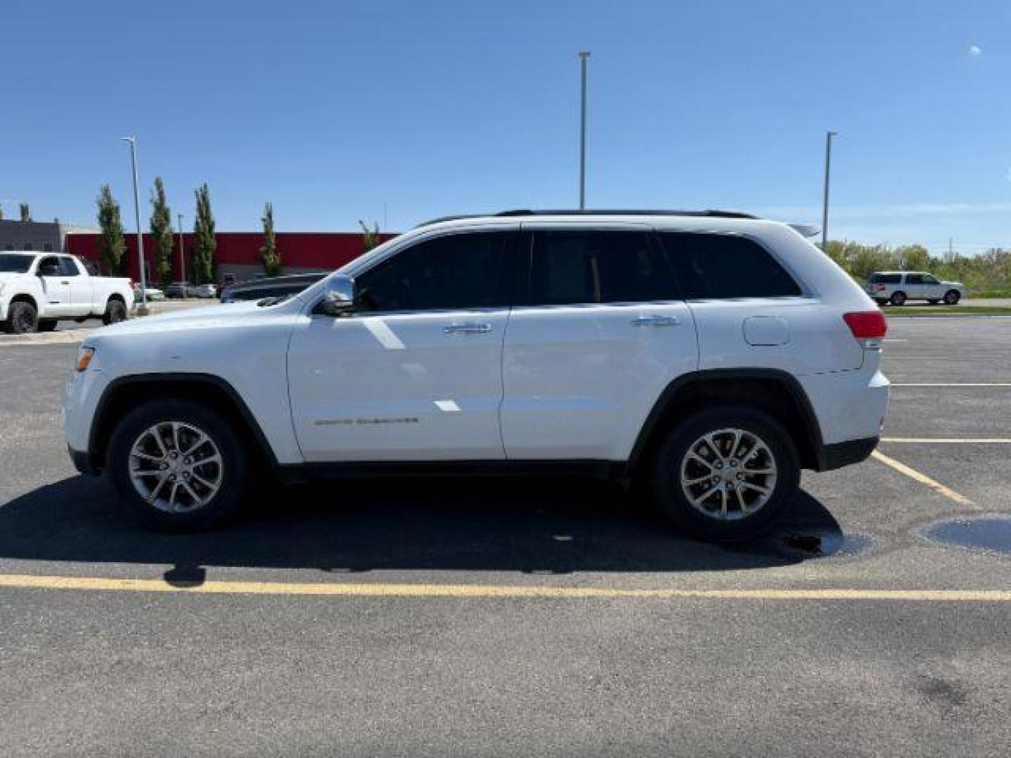 2014 Bright White Clearcoat /Black Jeep Grand Cherokee Limited (1C4RJFBG2EC) with an 3.6L V-6 DOHC engine, AUTOMATIC transmission, located at 1235 N Woodruff Ave., Idaho Falls, 83401, (208) 523-1053, 43.507172, -112.000488 - At Timberline Auto, finding a great deal on your next vehicle is always easy! Our experienced sales staff's goal is to help find you the right vehicle at the right price! Our knowledgeable finance department has options for almost any credit score. We offer extended service contract options to prote - Photo#0