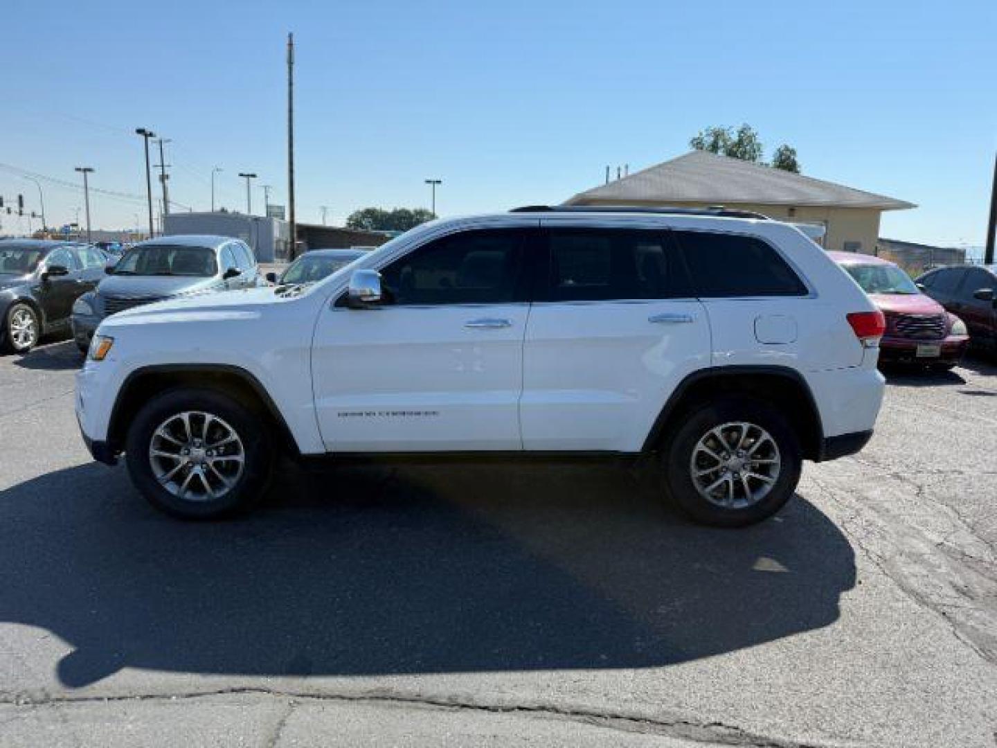 2014 Bright White Clearcoat /Black Jeep Grand Cherokee (1C4RJFBG2EC) with an 36L V-6 DOHC engine, Automatic transmission, located at 1175 N Woodruff Ave, Idaho Falls, ID, 83401, 43.506901, -111.999657 - Photo#26