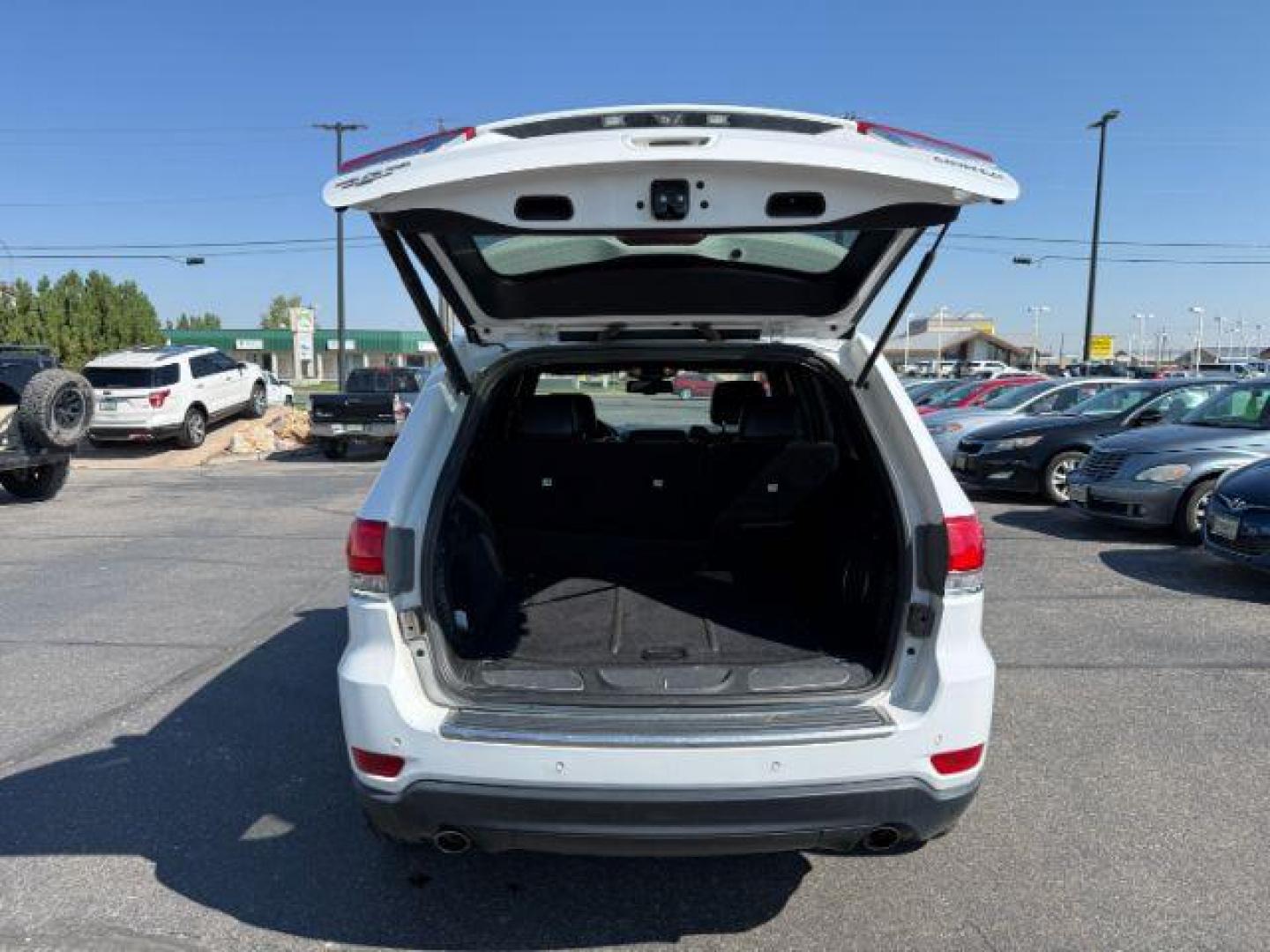 2014 Bright White Clearcoat /Black Jeep Grand Cherokee (1C4RJFBG2EC) with an 36L V-6 DOHC engine, Automatic transmission, located at 1175 N Woodruff Ave, Idaho Falls, ID, 83401, 43.506901, -111.999657 - Photo#30