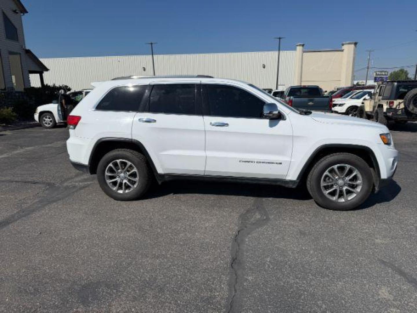 2014 Bright White Clearcoat /Black Jeep Grand Cherokee (1C4RJFBG2EC) with an 36L V-6 DOHC engine, Automatic transmission, located at 1175 N Woodruff Ave, Idaho Falls, ID, 83401, 43.506901, -111.999657 - Photo#33