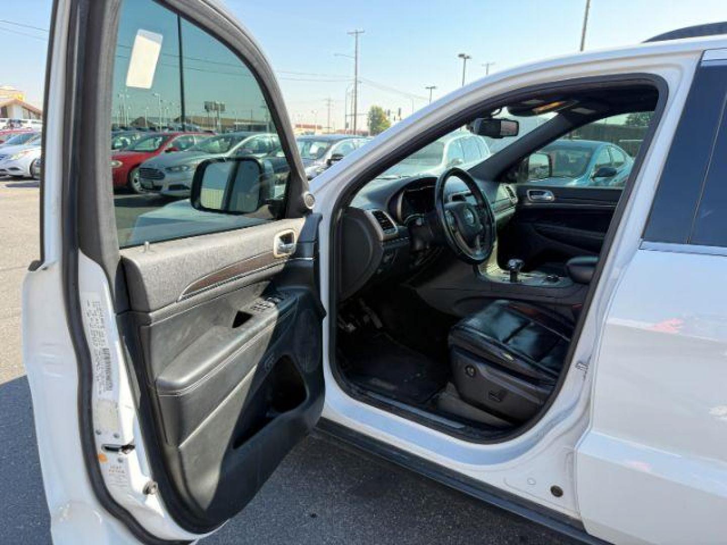 2014 Bright White Clearcoat /Black Jeep Grand Cherokee (1C4RJFBG2EC) with an 36L V-6 DOHC engine, Automatic transmission, located at 1175 N Woodruff Ave, Idaho Falls, ID, 83401, 43.506901, -111.999657 - Photo#37