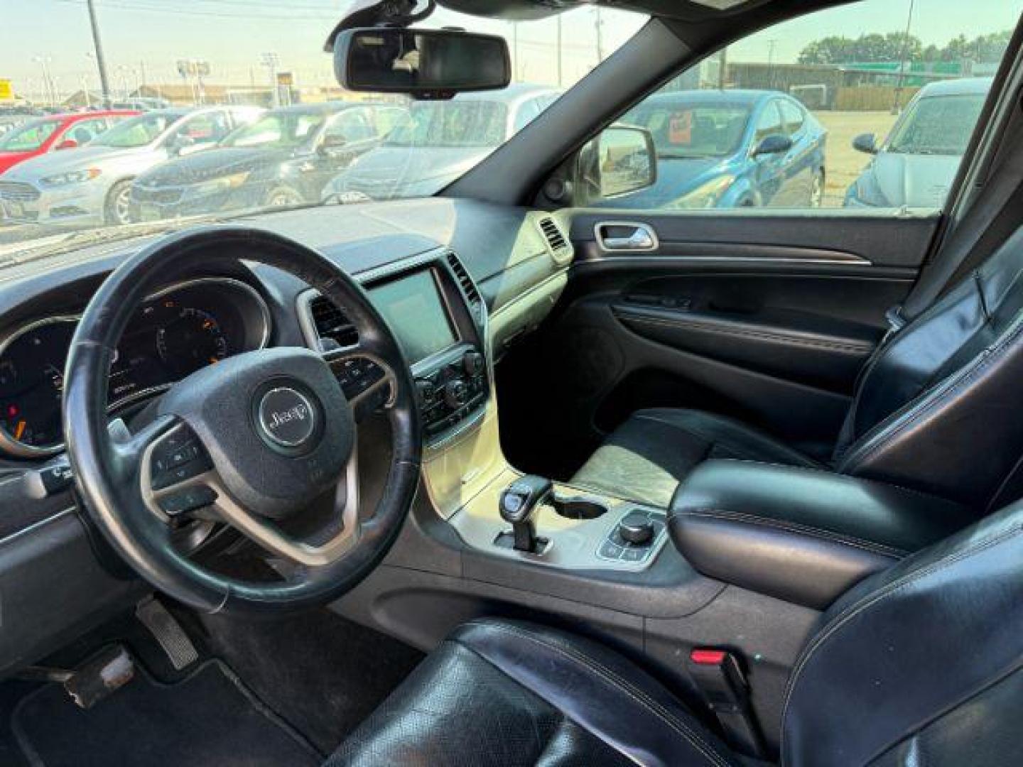 2014 Bright White Clearcoat /Black Jeep Grand Cherokee (1C4RJFBG2EC) with an 36L V-6 DOHC engine, Automatic transmission, located at 1175 N Woodruff Ave, Idaho Falls, ID, 83401, 43.506901, -111.999657 - Photo#39