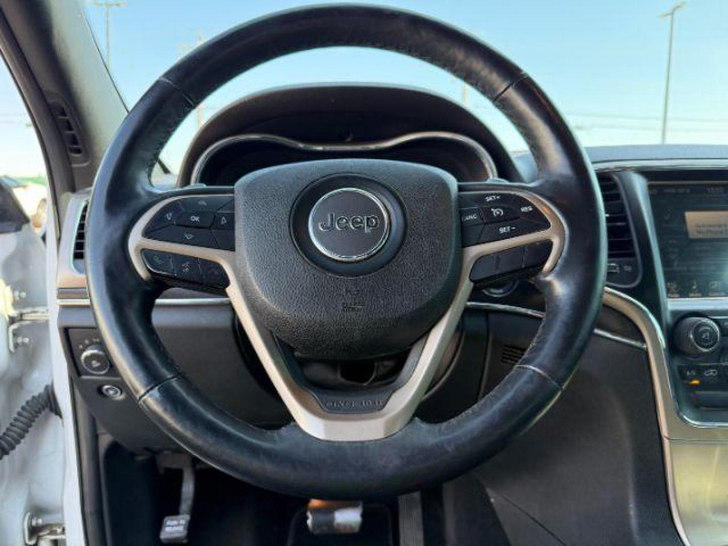 2014 Bright White Clearcoat /Black Jeep Grand Cherokee (1C4RJFBG2EC) with an 36L V-6 DOHC engine, Automatic transmission, located at 1175 N Woodruff Ave, Idaho Falls, ID, 83401, 43.506901, -111.999657 - Photo#40