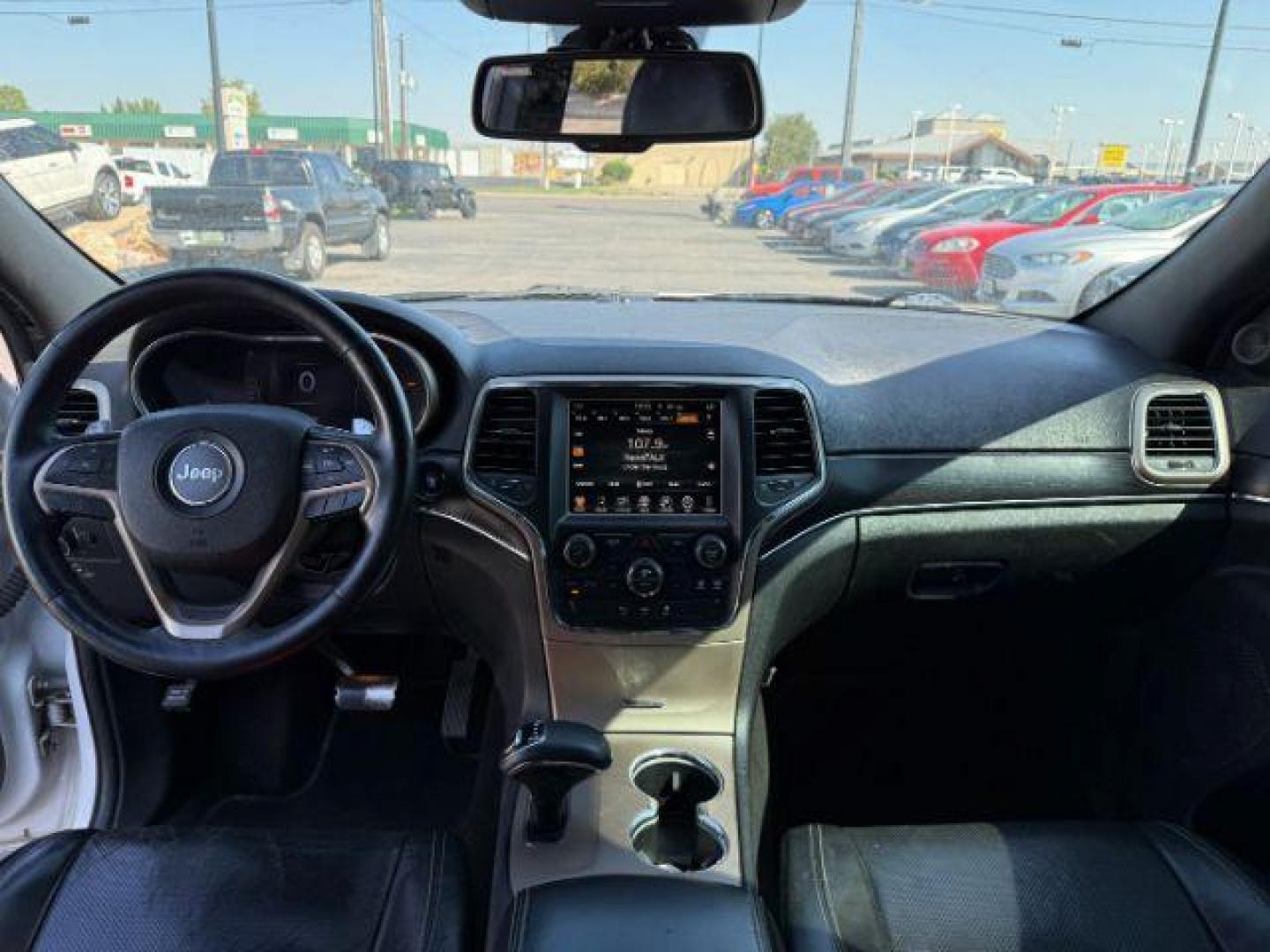 2014 Bright White Clearcoat /Black Jeep Grand Cherokee (1C4RJFBG2EC) with an 36L V-6 DOHC engine, Automatic transmission, located at 1175 N Woodruff Ave, Idaho Falls, ID, 83401, 43.506901, -111.999657 - Photo#46