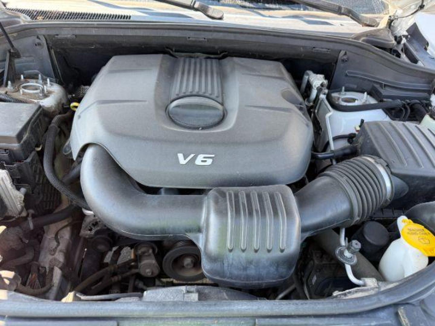 2014 Bright White Clearcoat /Black Jeep Grand Cherokee (1C4RJFBG2EC) with an 36L V-6 DOHC engine, Automatic transmission, located at 1175 N Woodruff Ave, Idaho Falls, ID, 83401, 43.506901, -111.999657 - Photo#49