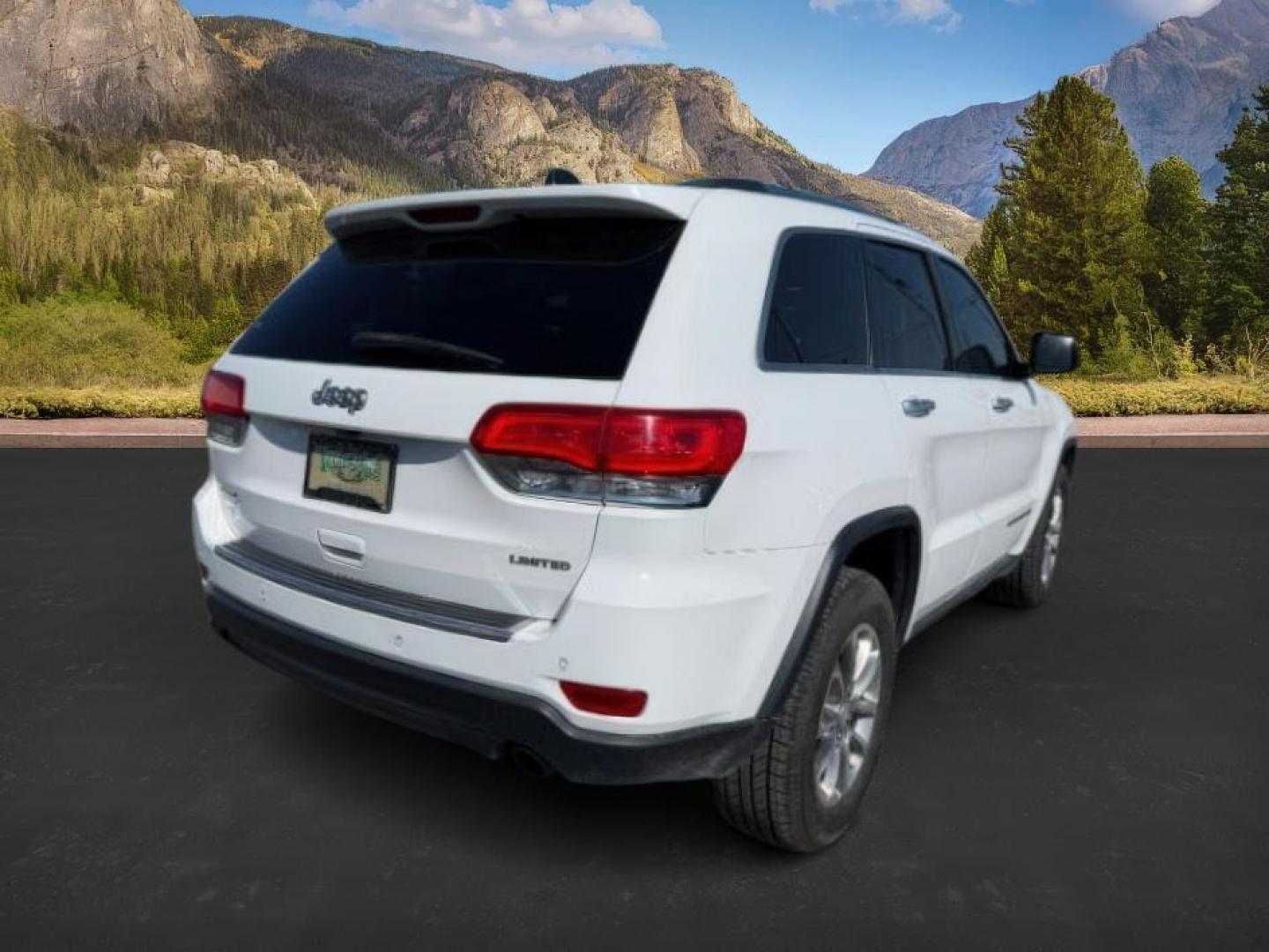 2014 Bright White Clearcoat /Black Jeep Grand Cherokee (1C4RJFBG2EC) with an 36L V-6 DOHC engine, Automatic transmission, located at 1175 N Woodruff Ave, Idaho Falls, ID, 83401, 43.506901, -111.999657 - Photo#7