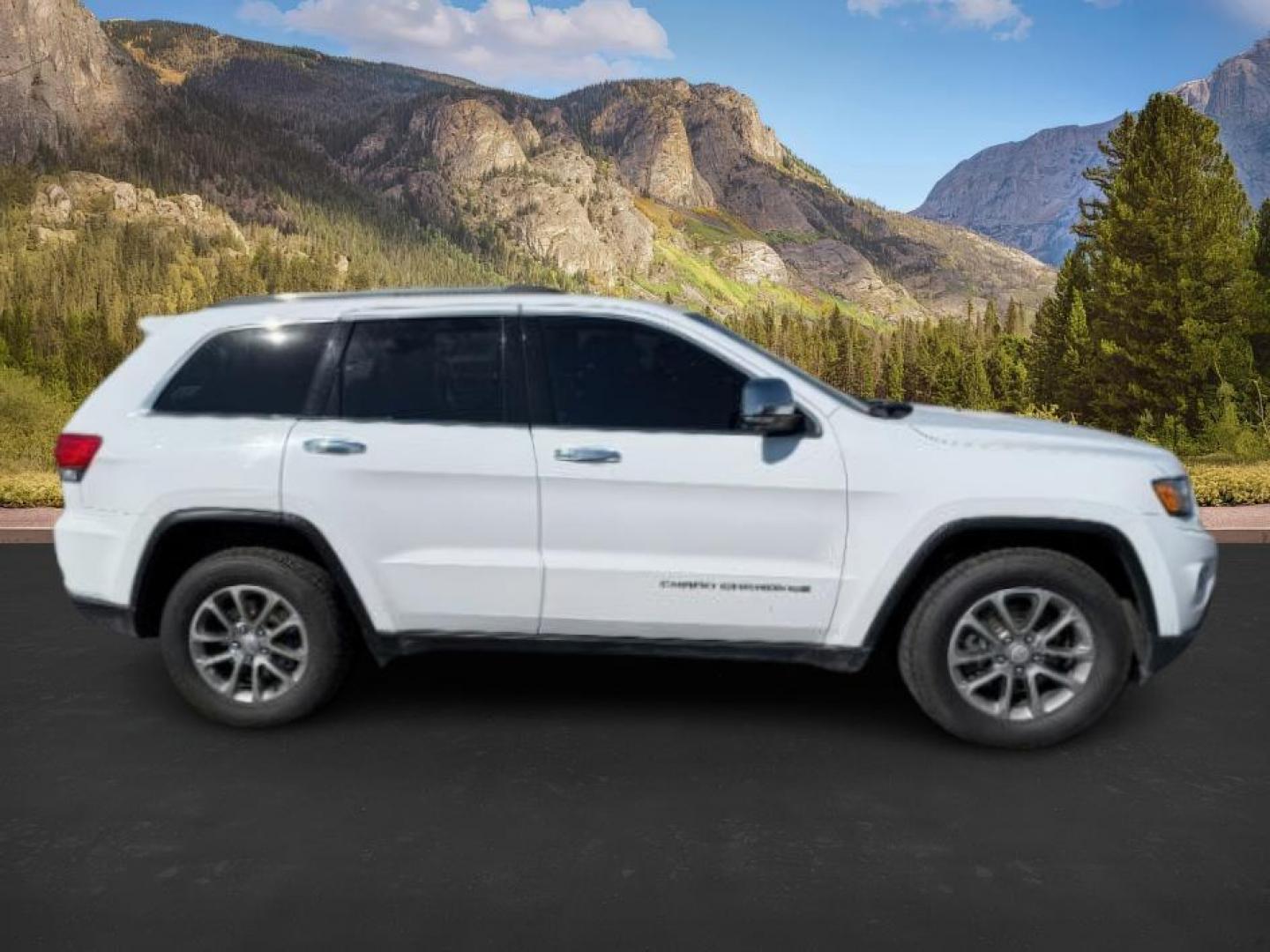 2014 Bright White Clearcoat /Black Jeep Grand Cherokee (1C4RJFBG2EC) with an 36L V-6 DOHC engine, Automatic transmission, located at 1175 N Woodruff Ave, Idaho Falls, ID, 83401, 43.506901, -111.999657 - Photo#8