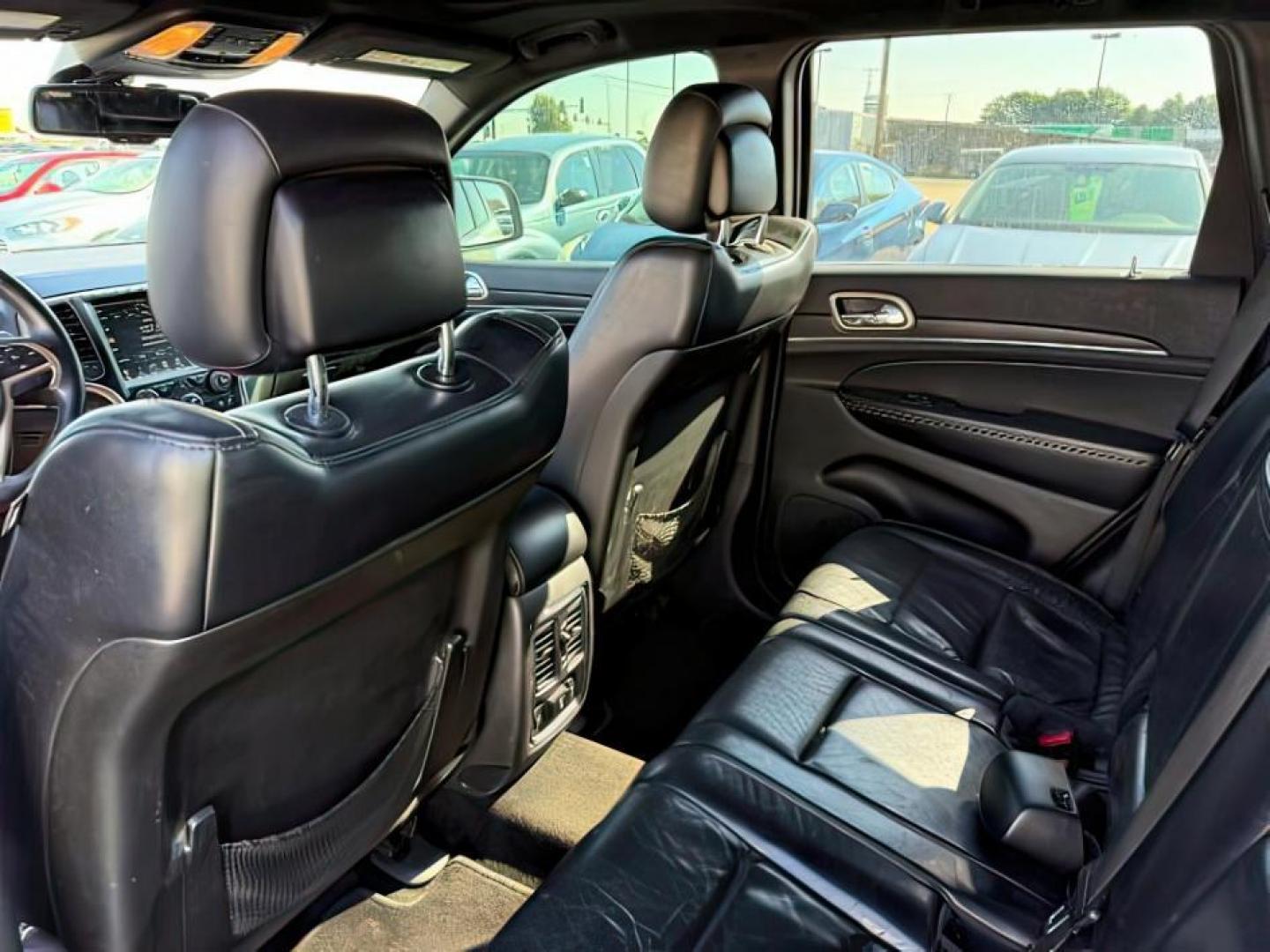 2014 Bright White Clearcoat /Black Jeep Grand Cherokee (1C4RJFBG2EC) with an 36L V-6 DOHC engine, Automatic transmission, located at 1175 N Woodruff Ave, Idaho Falls, ID, 83401, 43.506901, -111.999657 - Photo#23