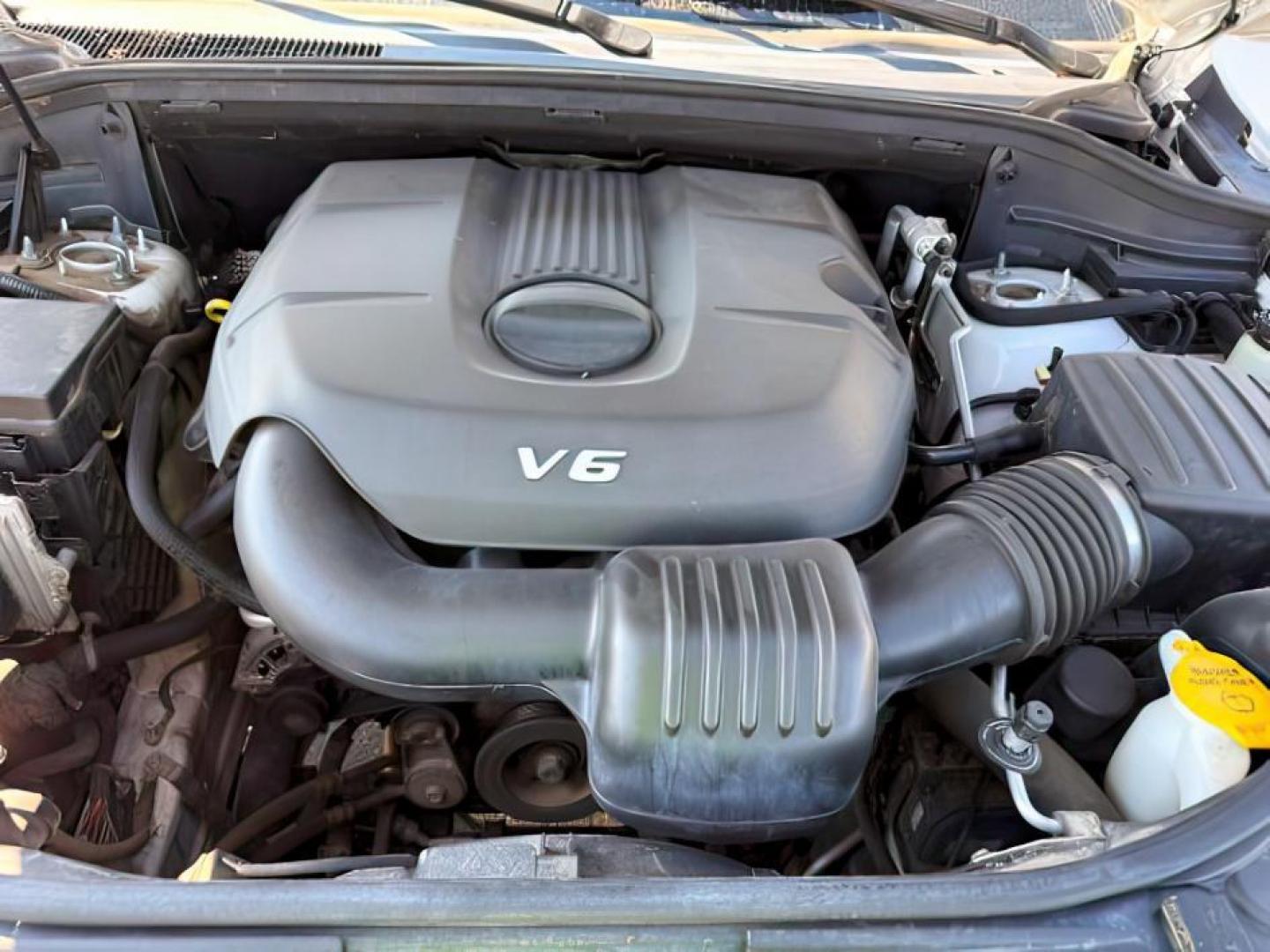 2014 Bright White Clearcoat /Black Jeep Grand Cherokee (1C4RJFBG2EC) with an 36L V-6 DOHC engine, Automatic transmission, located at 1175 N Woodruff Ave, Idaho Falls, ID, 83401, 43.506901, -111.999657 - Photo#24