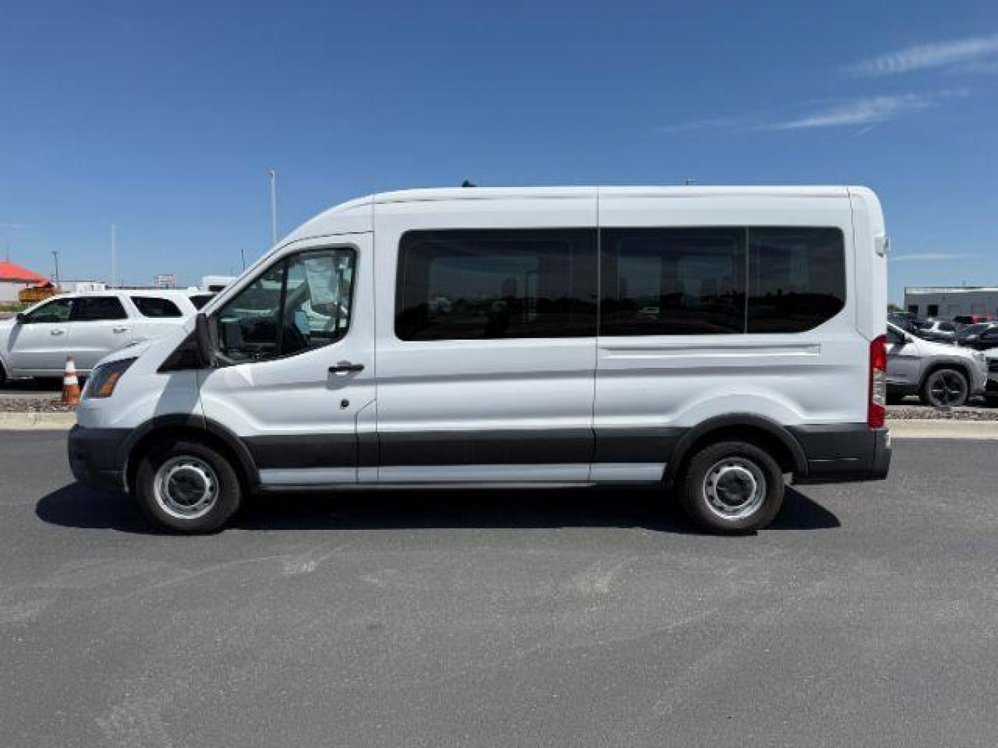 2023 Oxford White /Ebony Ford Transit-350 Passenger Van XL (1FBAX2C81PK) with an 3.5L V-6 port/direct injection engine, AUTOMATIC transmission, located at 1235 N Woodruff Ave., Idaho Falls, 83401, (208) 523-1053, 43.507172, -112.000488 - At Timberline Auto, finding a great deal on your next vehicle is always easy! Our experienced sales staff's goal is to help find you the right vehicle at the right price! Our knowledgeable finance department has options for almost any credit score. We offer extended service contract options to prote - Photo#1