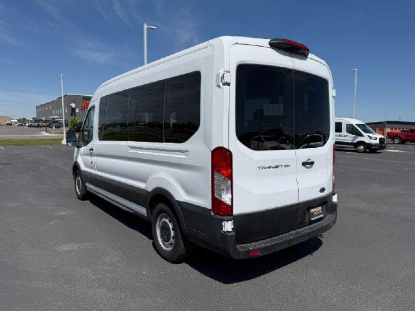2023 Oxford White /Ebony Ford Transit-350 Passenger Van XL (1FBAX2C81PK) with an 3.5L V-6 port/direct injection engine, AUTOMATIC transmission, located at 1235 N Woodruff Ave., Idaho Falls, 83401, (208) 523-1053, 43.507172, -112.000488 - At Timberline Auto, finding a great deal on your next vehicle is always easy! Our experienced sales staff's goal is to help find you the right vehicle at the right price! Our knowledgeable finance department has options for almost any credit score. We offer extended service contract options to prote - Photo#2