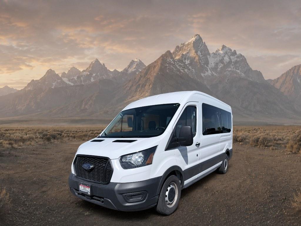 2023 Oxford White /Dark Palazzo Gray Ford Transit Wagon XL (1FBAX2C81PK) with an V6, 3.5L engine, 10-speed automatic transmission, located at 1175 N Woodruff Ave, Idaho Falls, ID, 83401, 43.506901, -111.999657 - <b>Vehicle Details</b><br>Looking for a spacious, capable passenger van in Idaho Falls, ID? This 2023 Ford Transit Wagon T-350 Med Roof Slide XL is a smart choice for families, shuttle use, or commercial transport. With 49,243 miles, rear-wheel drive, and a strong V6 3.5L gasoline/E85 engine, it del- Photo#0
