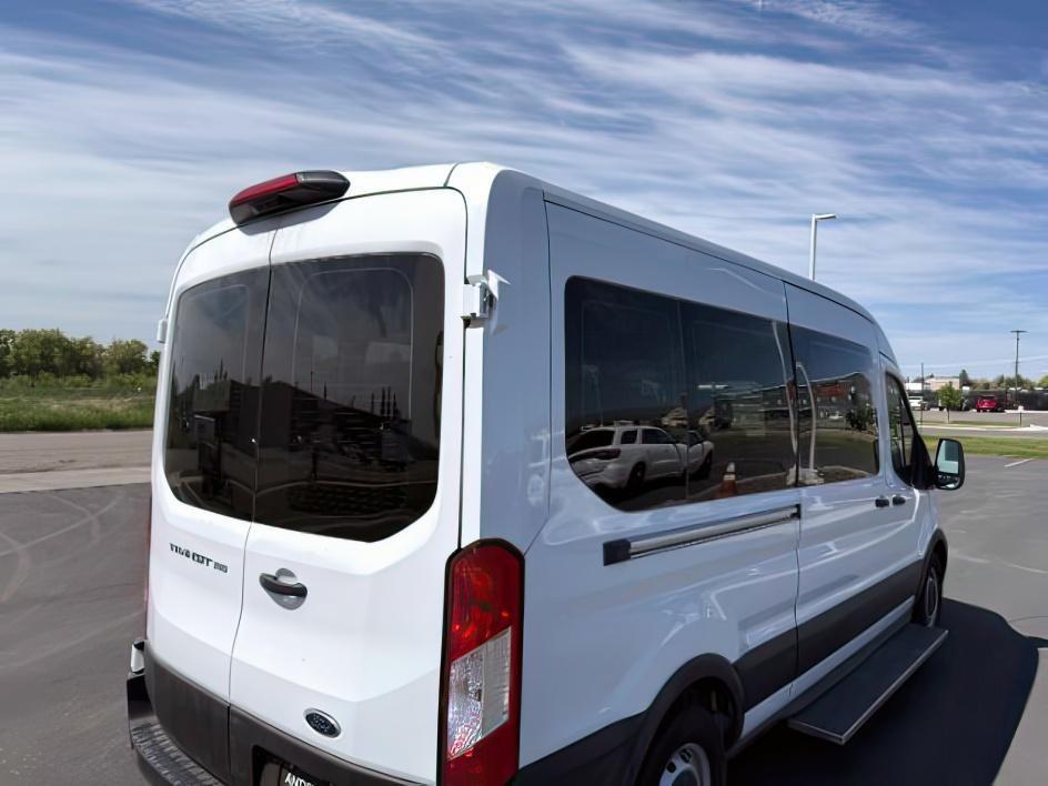 2023 Oxford White /Dark Palazzo Gray Ford Transit Wagon XL (1FBAX2C81PK) with an V6, 3.5L engine, 10-speed automatic transmission, located at 1175 N Woodruff Ave, Idaho Falls, ID, 83401, 43.506901, -111.999657 - <b>Vehicle Details</b><br>Looking for a spacious, capable passenger van in Idaho Falls, ID? This 2023 Ford Transit Wagon T-350 Med Roof Slide XL is a smart choice for families, shuttle use, or commercial transport. With 49,243 miles, rear-wheel drive, and a strong V6 3.5L gasoline/E85 engine, it del- Photo#27