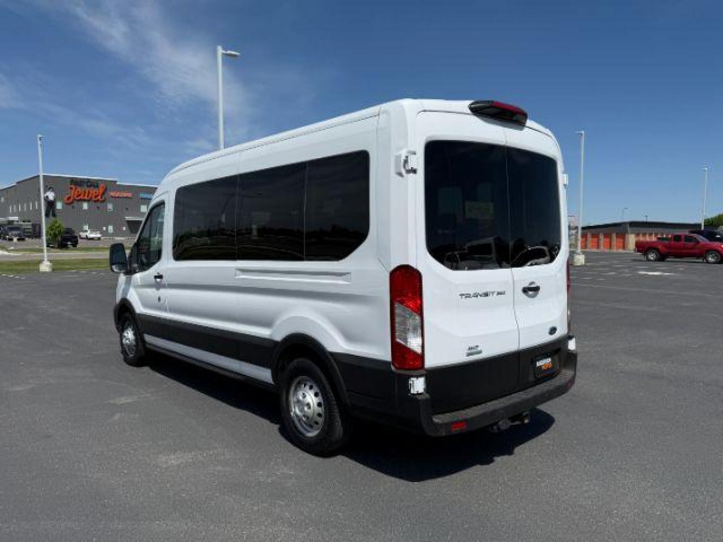 2023 Oxford White /Ebony Ford Transit-350 Passenger Van XL (1FBAX9CG1PK) with an EcoBoost 3.5L V-6 gasoline direct injection engine, AUTOMATIC transmission, located at 1235 N Woodruff Ave., Idaho Falls, 83401, (208) 523-1053, 43.507172, -112.000488 - At Timberline Auto, finding a great deal on your next vehicle is always easy! Our experienced sales staff's goal is to help find you the right vehicle at the right price! Our knowledgeable finance department has options for almost any credit score. We offer extended service contract options to prote - Photo#2
