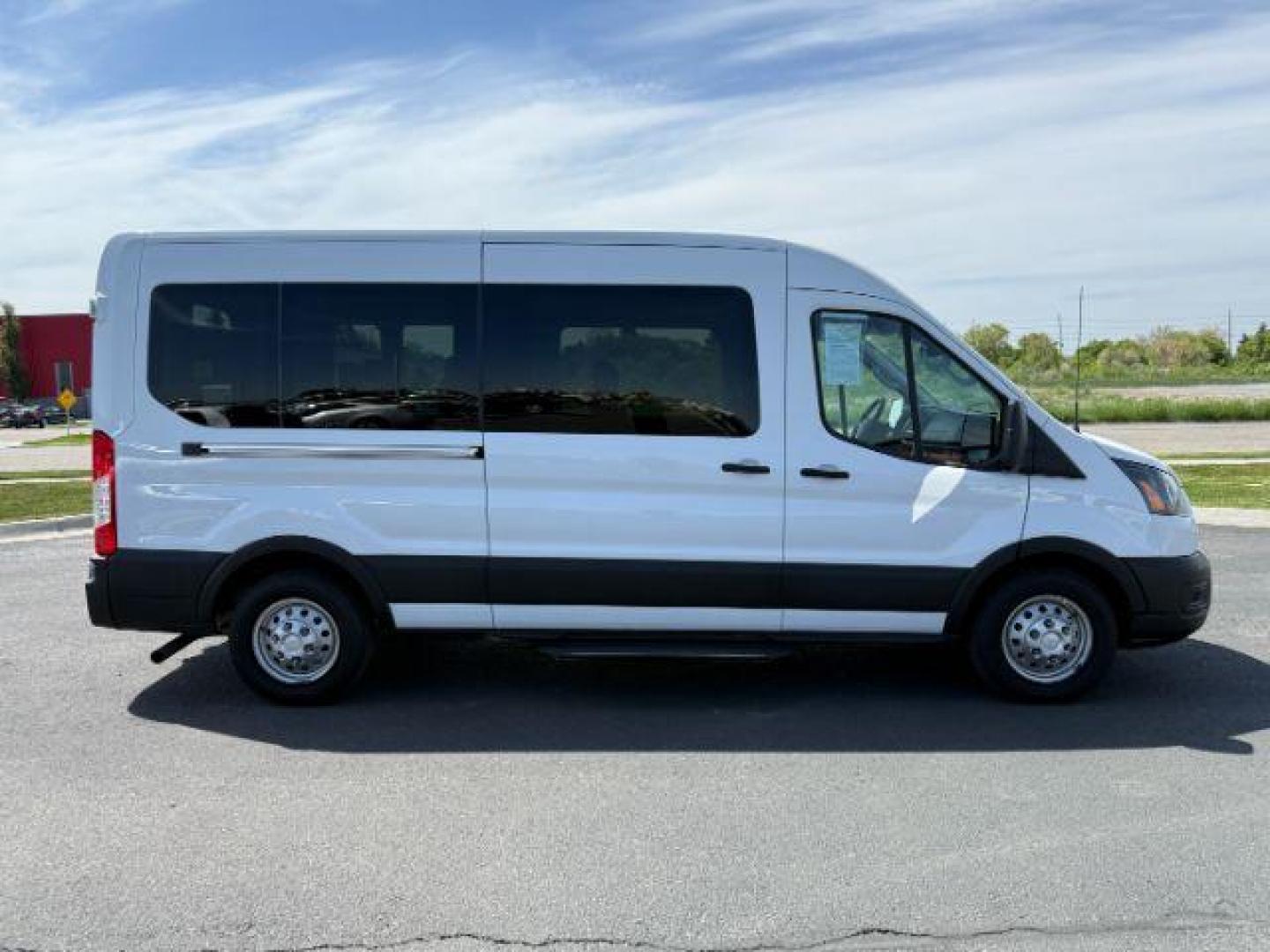 2023 Oxford White /Ebony Ford Transit-350 Passenger Van XL (1FBAX9CG1PK) with an EcoBoost 3.5L V-6 gasoline direct injection engine, AUTOMATIC transmission, located at 1235 N Woodruff Ave., Idaho Falls, 83401, (208) 523-1053, 43.507172, -112.000488 - At Timberline Auto, finding a great deal on your next vehicle is always easy! Our experienced sales staff's goal is to help find you the right vehicle at the right price! Our knowledgeable finance department has options for almost any credit score. We offer extended service contract options to prote - Photo#7