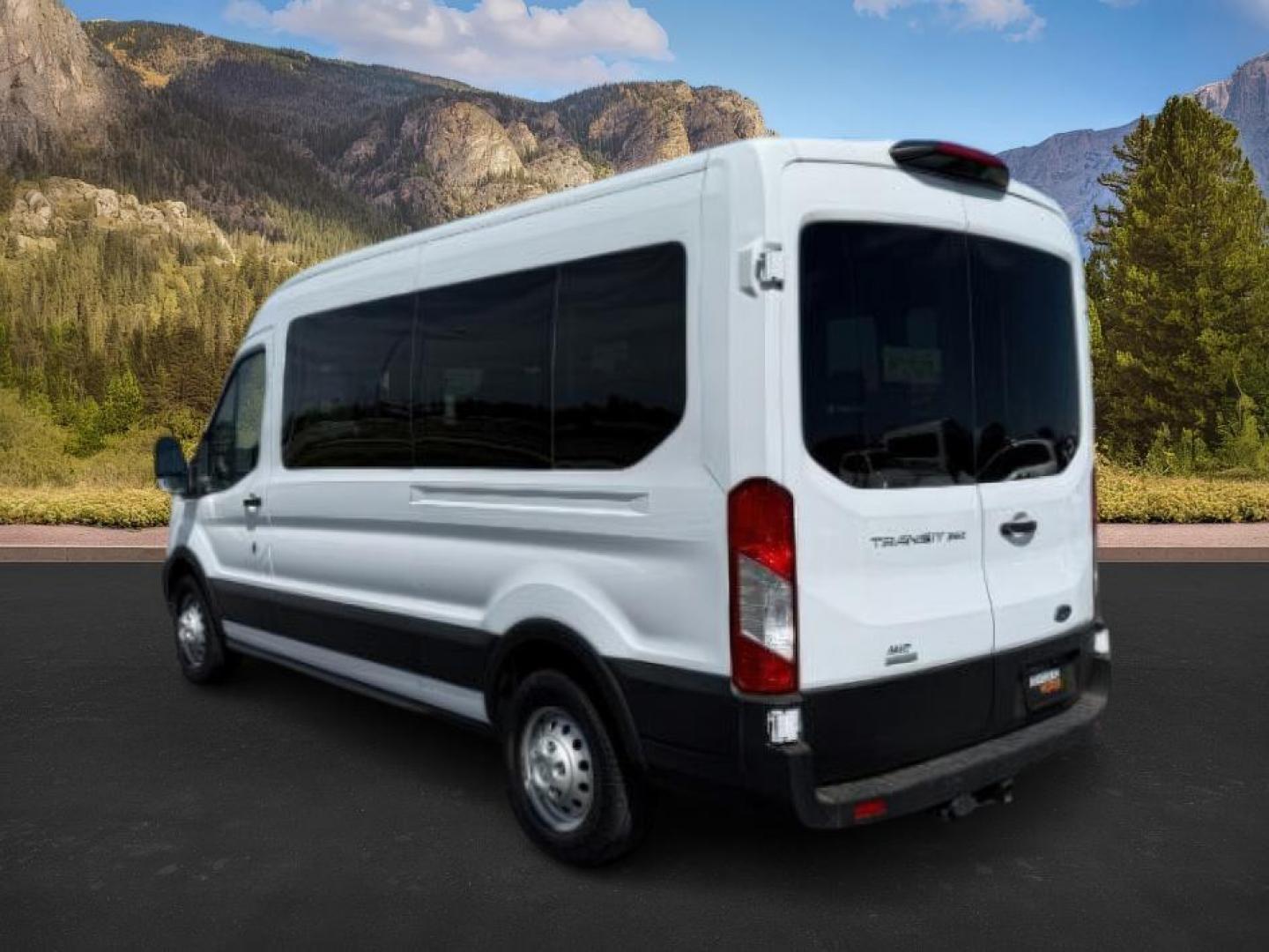 2023 Oxford White /Ebony Ford Transit-350 Passenger Van (1FBAX9CG1PK) with an EcoBoost 35L V-6 gasoline direct injection engine, Automatic transmission, located at 1175 N Woodruff Ave, Idaho Falls, ID, 83401, 43.506901, -111.999657 - At Timberline Auto, finding a great deal on your next vehicle is always easy! Our experienced sales staff's goal is to help find you the right vehicle at the right price! Our knowledgeable finance department has options for almost any credit score. We offer extended service contract options to prote - Photo#2