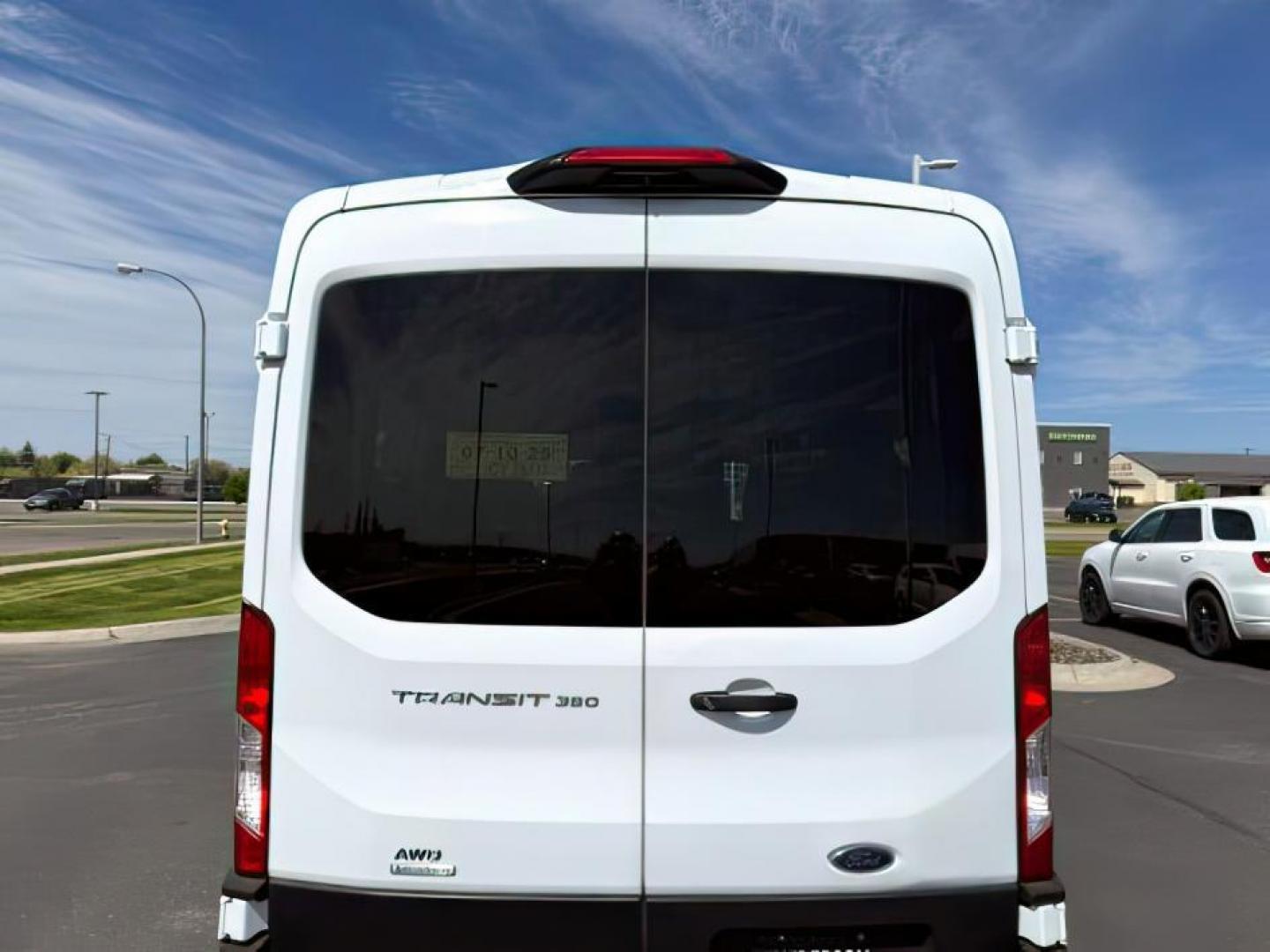 2023 Oxford White /Ebony Ford Transit-350 Passenger Van (1FBAX9CG1PK) with an EcoBoost 35L V-6 gasoline direct injection engine, Automatic transmission, located at 1175 N Woodruff Ave, Idaho Falls, ID, 83401, 43.506901, -111.999657 - At Timberline Auto, finding a great deal on your next vehicle is always easy! Our experienced sales staff's goal is to help find you the right vehicle at the right price! Our knowledgeable finance department has options for almost any credit score. We offer extended service contract options to prote - Photo#5