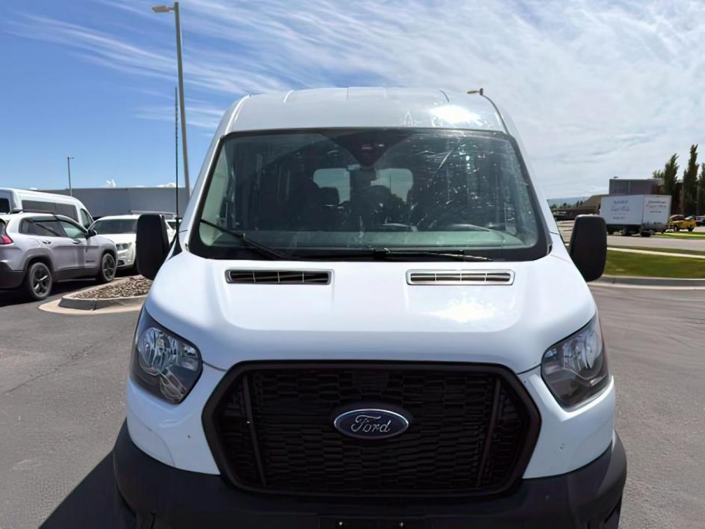 2023 Oxford White /Ebony Ford Transit-350 Passenger Van (1FBAX9CG1PK) with an EcoBoost 35L V-6 gasoline direct injection engine, Automatic transmission, located at 1175 N Woodruff Ave, Idaho Falls, ID, 83401, 43.506901, -111.999657 - At Timberline Auto, finding a great deal on your next vehicle is always easy! Our experienced sales staff's goal is to help find you the right vehicle at the right price! Our knowledgeable finance department has options for almost any credit score. We offer extended service contract options to prote - Photo#7