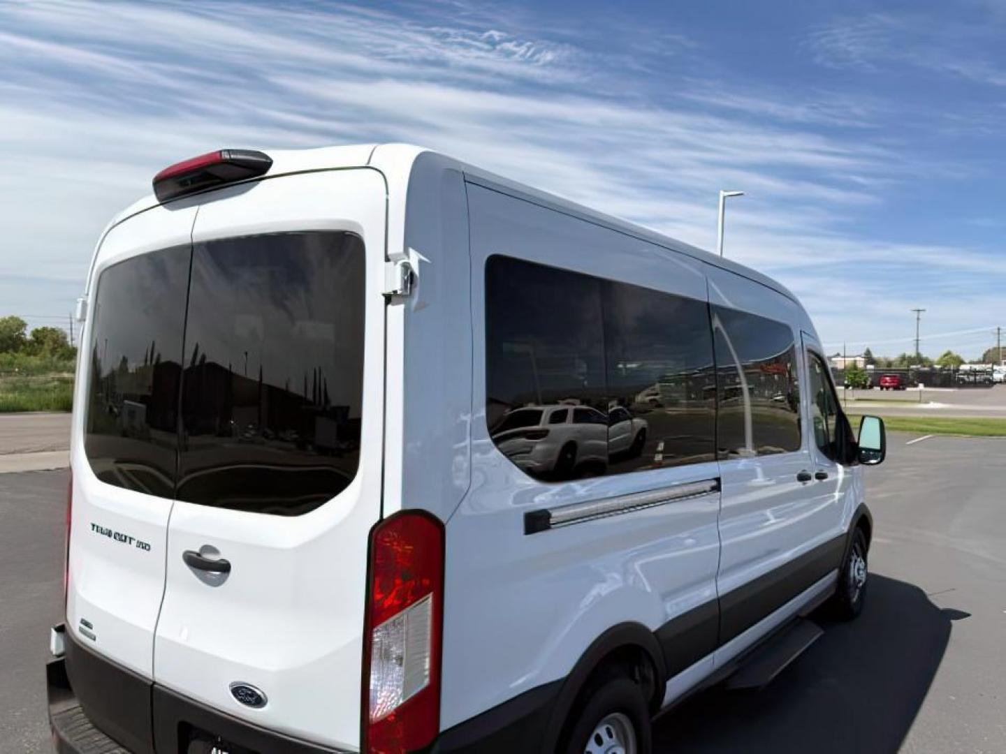 2023 Oxford White /Ebony Ford Transit-350 Passenger Van (1FBAX9CG1PK) with an EcoBoost 35L V-6 gasoline direct injection engine, Automatic transmission, located at 1175 N Woodruff Ave, Idaho Falls, ID, 83401, 43.506901, -111.999657 - At Timberline Auto, finding a great deal on your next vehicle is always easy! Our experienced sales staff's goal is to help find you the right vehicle at the right price! Our knowledgeable finance department has options for almost any credit score. We offer extended service contract options to prote - Photo#9