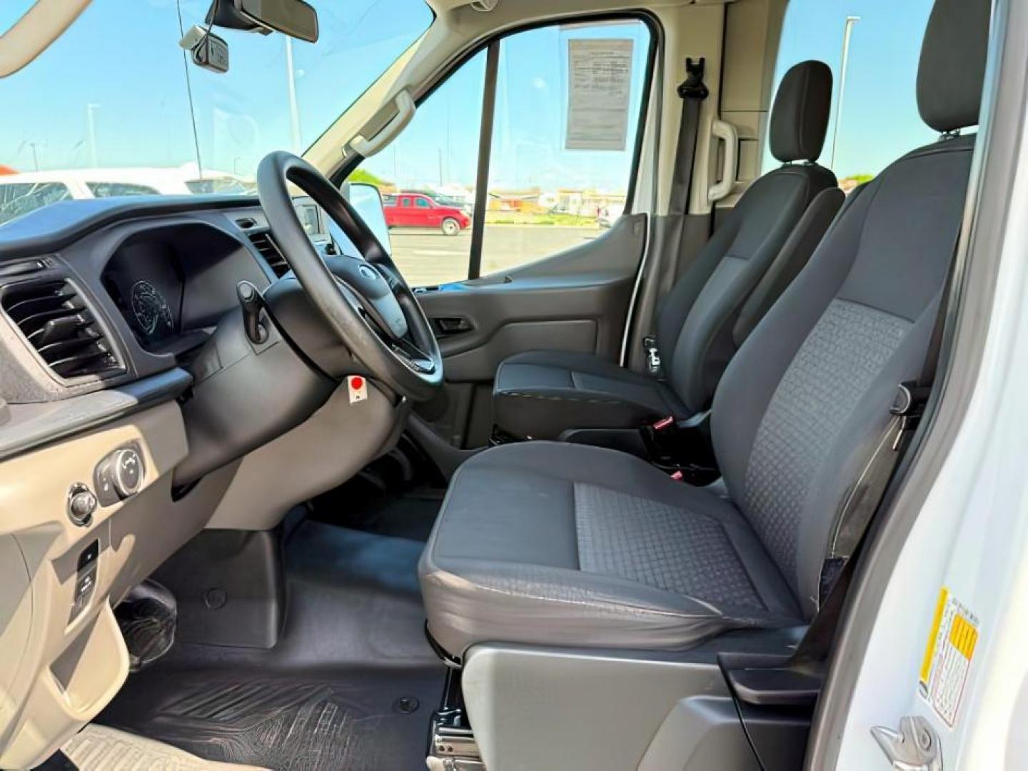 2023 Oxford White /Ebony Ford Transit-350 Passenger Van (1FBAX9CG1PK) with an EcoBoost 35L V-6 gasoline direct injection engine, Automatic transmission, located at 1175 N Woodruff Ave, Idaho Falls, ID, 83401, 43.506901, -111.999657 - At Timberline Auto, finding a great deal on your next vehicle is always easy! Our experienced sales staff's goal is to help find you the right vehicle at the right price! Our knowledgeable finance department has options for almost any credit score. We offer extended service contract options to prote - Photo#11
