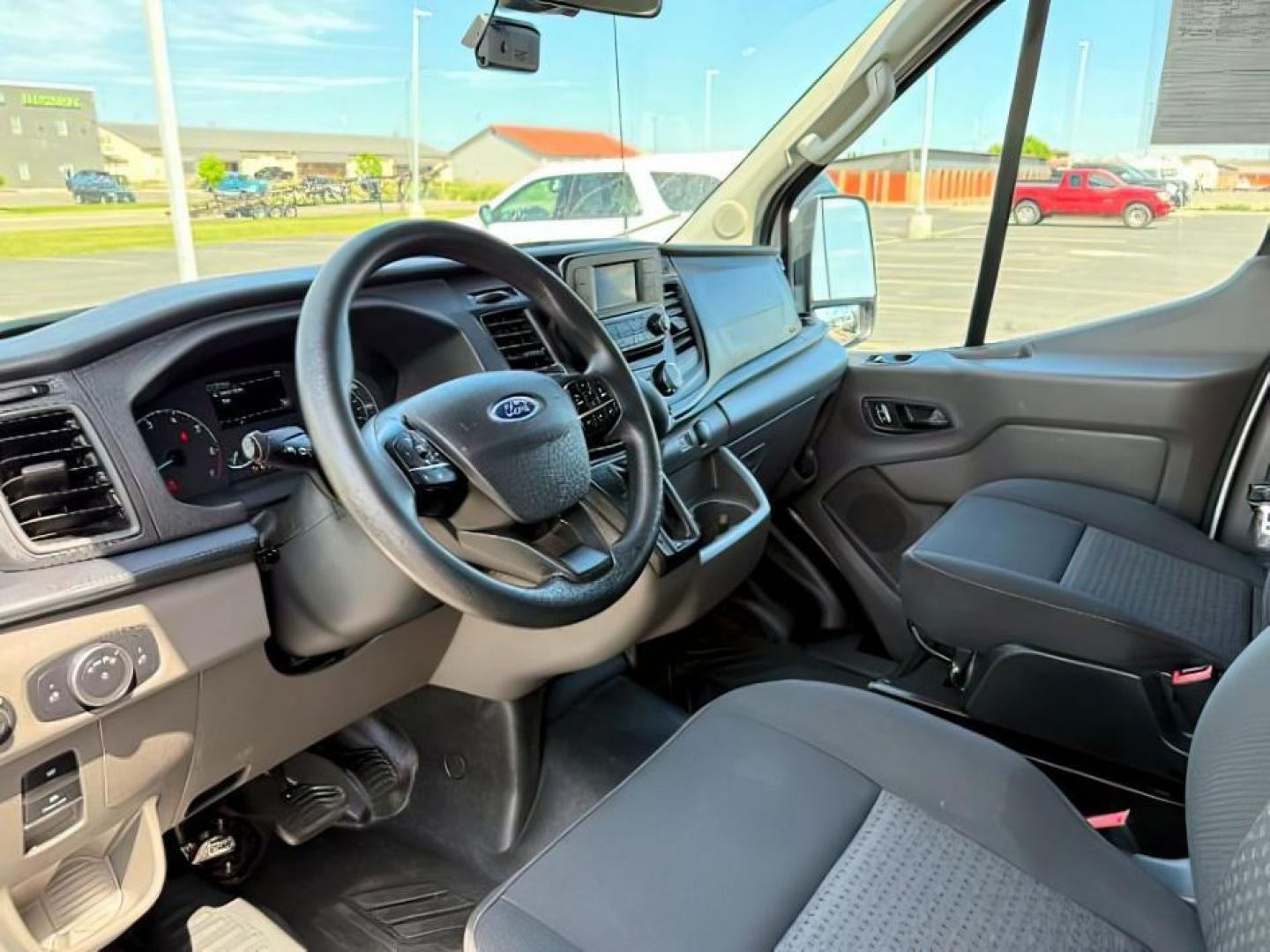2023 Oxford White /Ebony Ford Transit-350 Passenger Van (1FBAX9CG1PK) with an EcoBoost 35L V-6 gasoline direct injection engine, Automatic transmission, located at 1175 N Woodruff Ave, Idaho Falls, ID, 83401, 43.506901, -111.999657 - At Timberline Auto, finding a great deal on your next vehicle is always easy! Our experienced sales staff's goal is to help find you the right vehicle at the right price! Our knowledgeable finance department has options for almost any credit score. We offer extended service contract options to prote - Photo#12