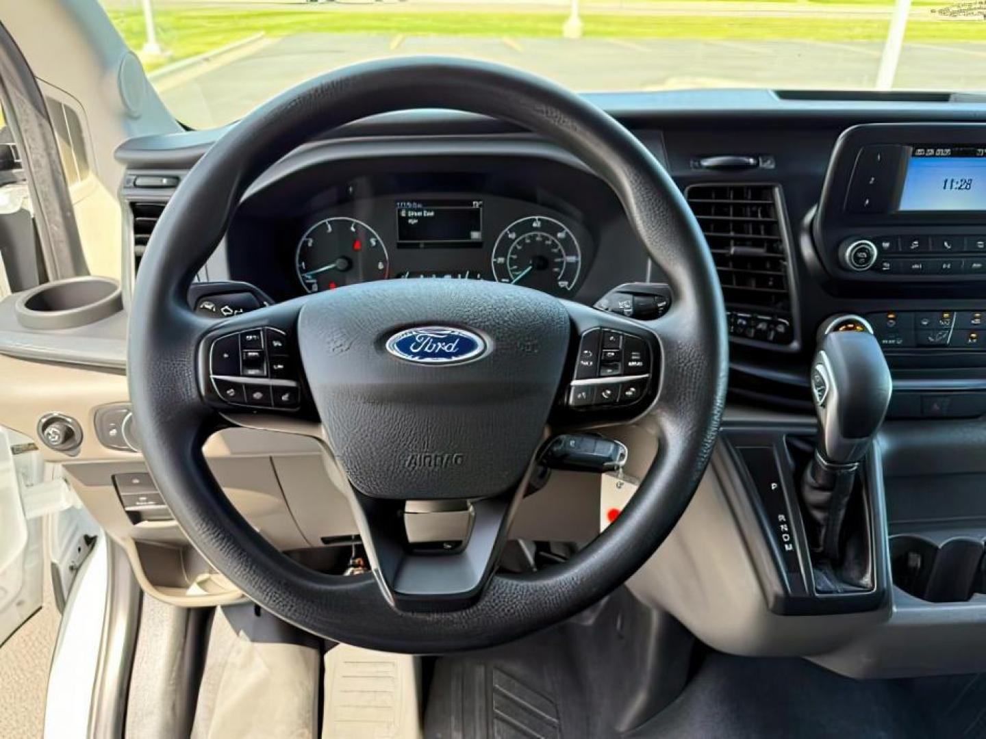 2023 Oxford White /Ebony Ford Transit-350 Passenger Van (1FBAX9CG1PK) with an EcoBoost 35L V-6 gasoline direct injection engine, Automatic transmission, located at 1175 N Woodruff Ave, Idaho Falls, ID, 83401, 43.506901, -111.999657 - At Timberline Auto, finding a great deal on your next vehicle is always easy! Our experienced sales staff's goal is to help find you the right vehicle at the right price! Our knowledgeable finance department has options for almost any credit score. We offer extended service contract options to prote - Photo#13