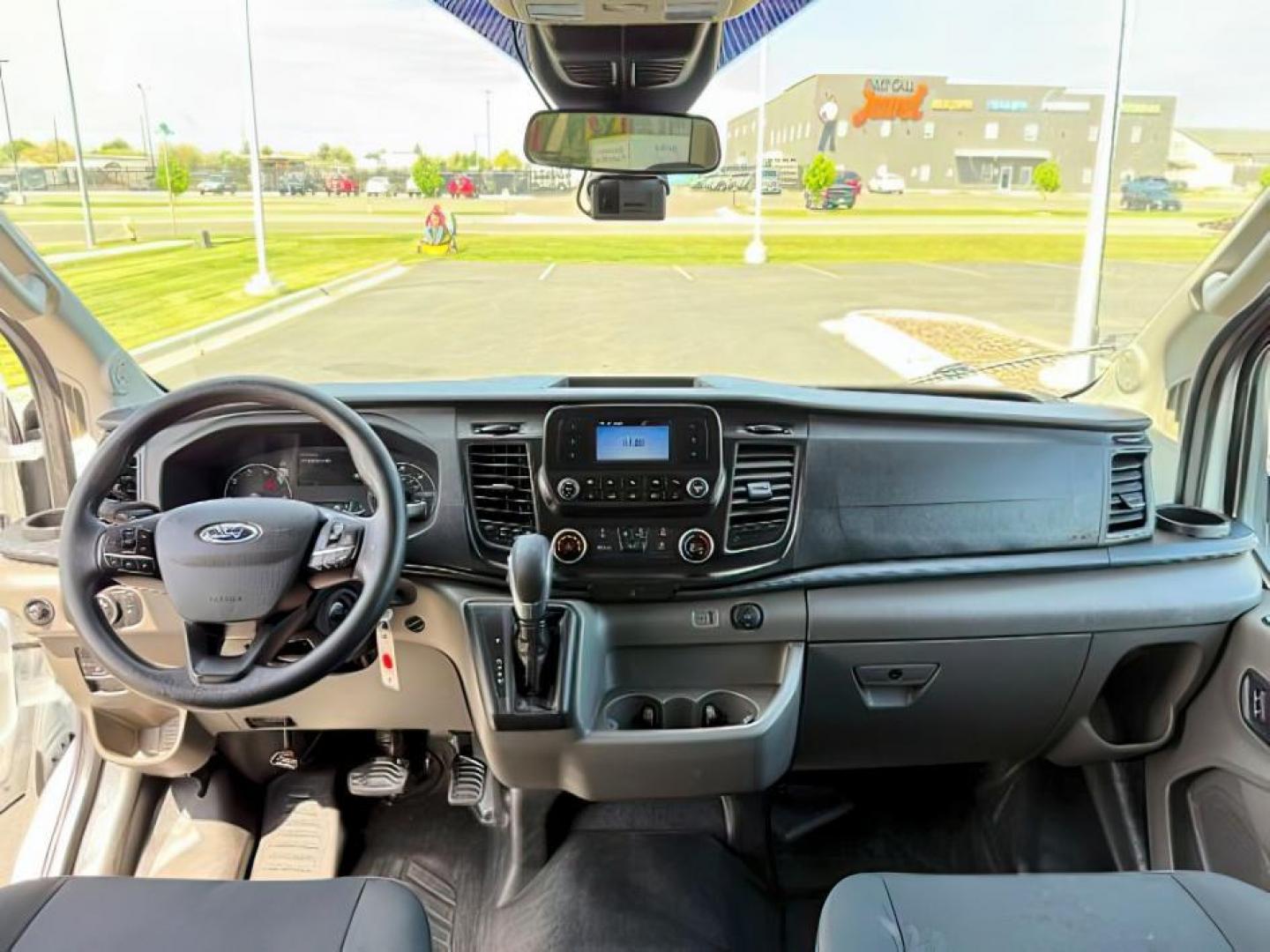 2023 Oxford White /Ebony Ford Transit-350 Passenger Van (1FBAX9CG1PK) with an EcoBoost 35L V-6 gasoline direct injection engine, Automatic transmission, located at 1175 N Woodruff Ave, Idaho Falls, ID, 83401, 43.506901, -111.999657 - At Timberline Auto, finding a great deal on your next vehicle is always easy! Our experienced sales staff's goal is to help find you the right vehicle at the right price! Our knowledgeable finance department has options for almost any credit score. We offer extended service contract options to prote - Photo#18