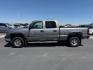 2006 GRAY /CLOTH Chevrolet Silverado 2500HD LS (1GCHK23DX6F) with an 6.6 engine, AUTOMATIC transmission, located at 1235 N Woodruff Ave., Idaho Falls, 83401, (208) 523-1053, 43.507172, -112.000488 - At Timberline Auto, finding a great deal on your next vehicle is always easy! Our experienced sales staff's goal is to help find you the right vehicle at the right price! Our knowledgeable finance department has options for almost any credit score. We offer extended service contract options to prote - Photo#0