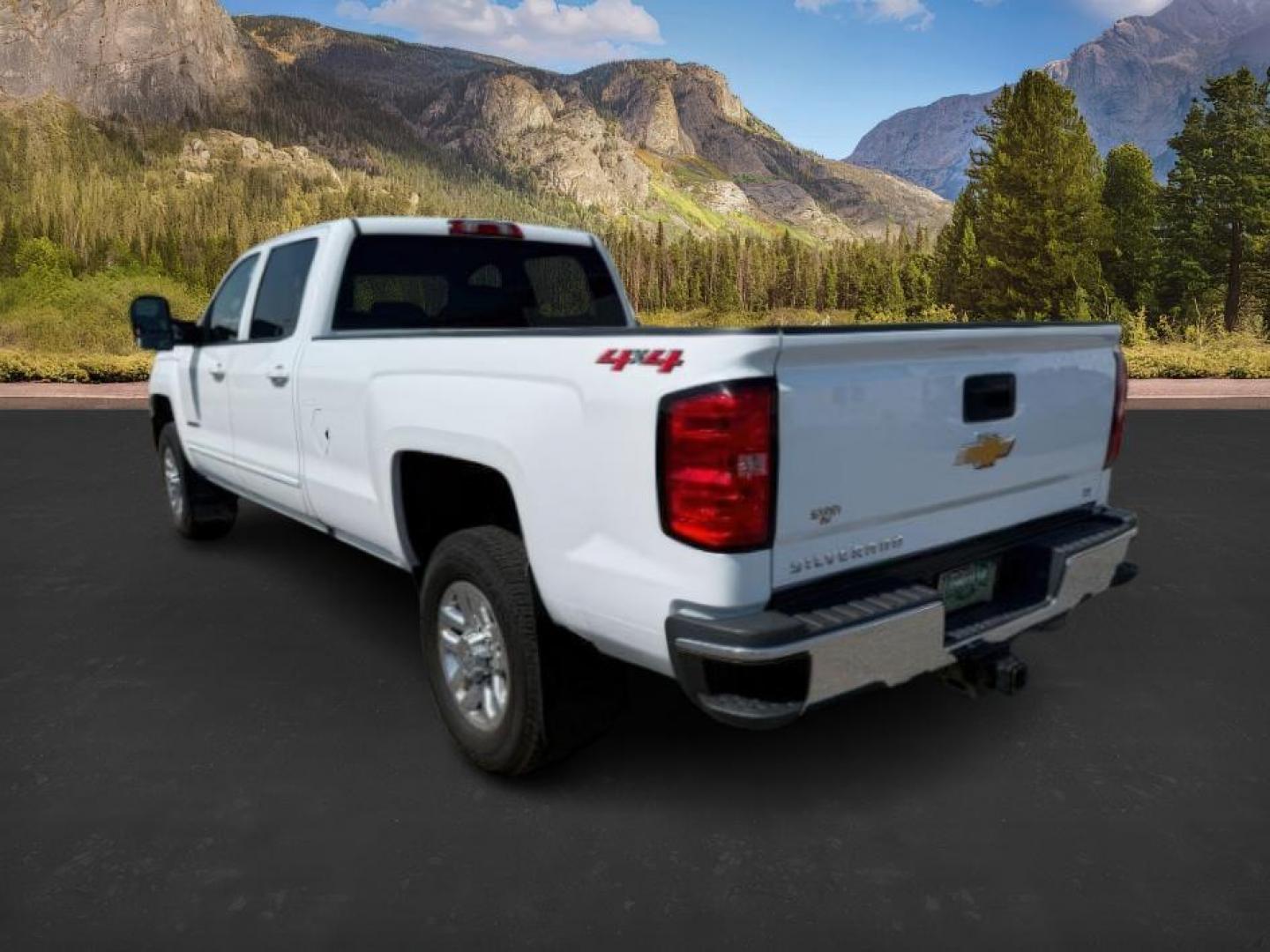 2019 Summit White /Jet Black Chevrolet Silverado 3500HD (1GC4KWCY8KF) with an 66L DURAMAX engine, Automatic transmission, located at 1175 N Woodruff Ave, Idaho Falls, ID, 83401, 43.506901, -111.999657 - At Timberline Auto, finding a great deal on your next vehicle is always easy! Our experienced sales staff's goal is to help find you the right vehicle at the right price! Our knowledgeable finance department has options for almost any credit score. We offer extended service contract options to prote - Photo#2