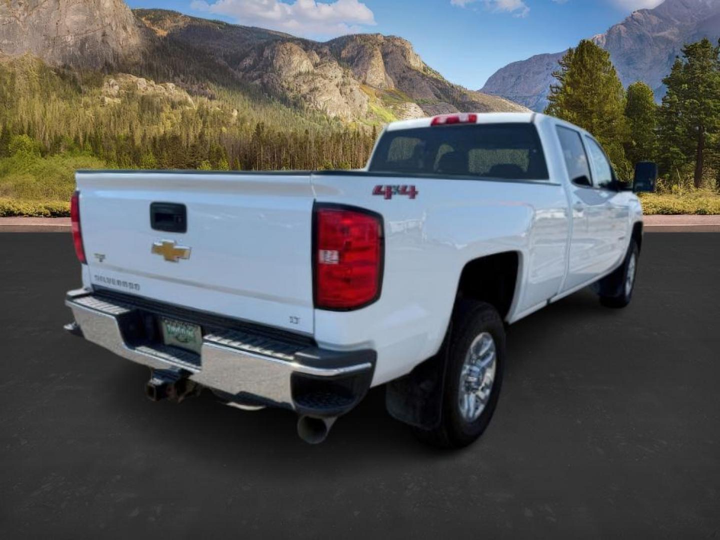 2019 Summit White /Jet Black Chevrolet Silverado 3500HD (1GC4KWCY8KF) with an 66L DURAMAX engine, Automatic transmission, located at 1175 N Woodruff Ave, Idaho Falls, ID, 83401, 43.506901, -111.999657 - At Timberline Auto, finding a great deal on your next vehicle is always easy! Our experienced sales staff's goal is to help find you the right vehicle at the right price! Our knowledgeable finance department has options for almost any credit score. We offer extended service contract options to prote - Photo#4
