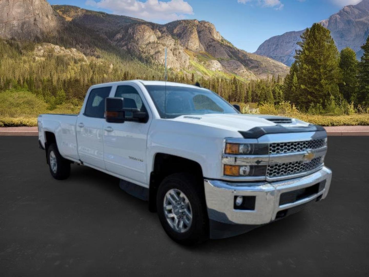 2019 Summit White /Jet Black Chevrolet Silverado 3500HD (1GC4KWCY8KF) with an 66L DURAMAX engine, Automatic transmission, located at 1175 N Woodruff Ave, Idaho Falls, ID, 83401, 43.506901, -111.999657 - At Timberline Auto, finding a great deal on your next vehicle is always easy! Our experienced sales staff's goal is to help find you the right vehicle at the right price! Our knowledgeable finance department has options for almost any credit score. We offer extended service contract options to prote - Photo#6