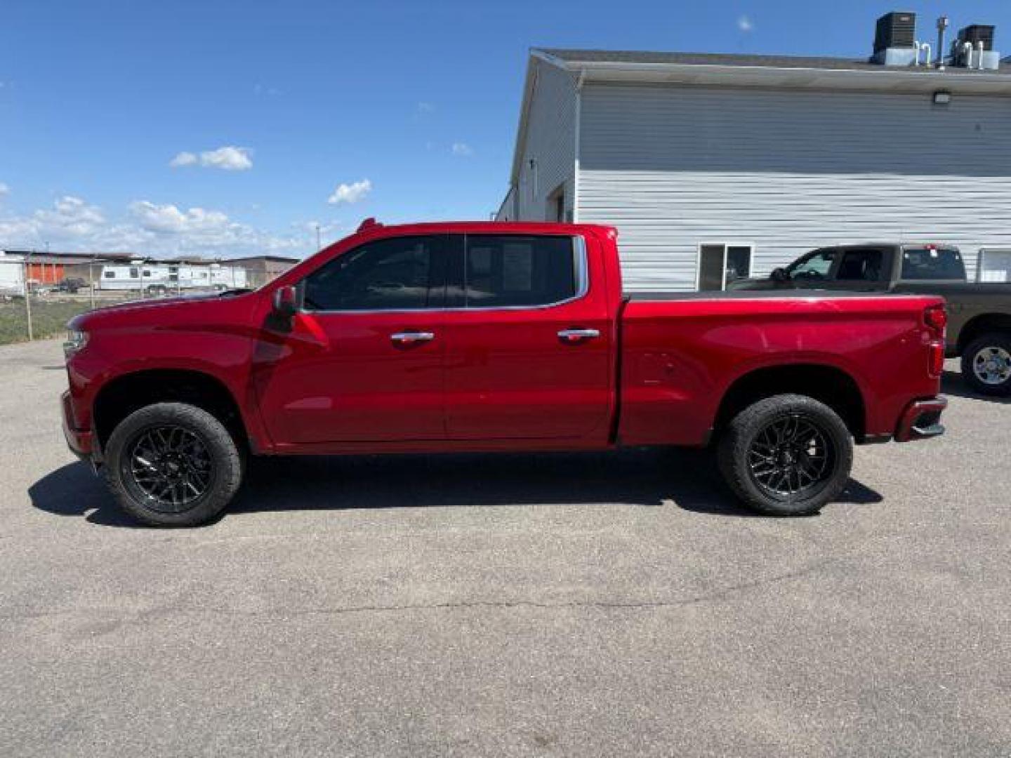 2021 Cherry Red Tintcoat /Jet Black/Umber Chevrolet Silverado 1500 4WD Crew Cab Standard Bed High Country (3GCUYHET6MG) with an Duramax 3L I-6 diesel direct injection engine, AUTOMATIC transmission, located at 1235 N Woodruff Ave., Idaho Falls, 83401, (208) 523-1053, 43.507172, -112.000488 - At Timberline Auto, finding a great deal on your next vehicle is always easy! Our experienced sales staff's goal is to help find you the right vehicle at the right price! Our knowledgeable finance department has options for almost any credit score. We offer extended service contract options to prote - Photo#1
