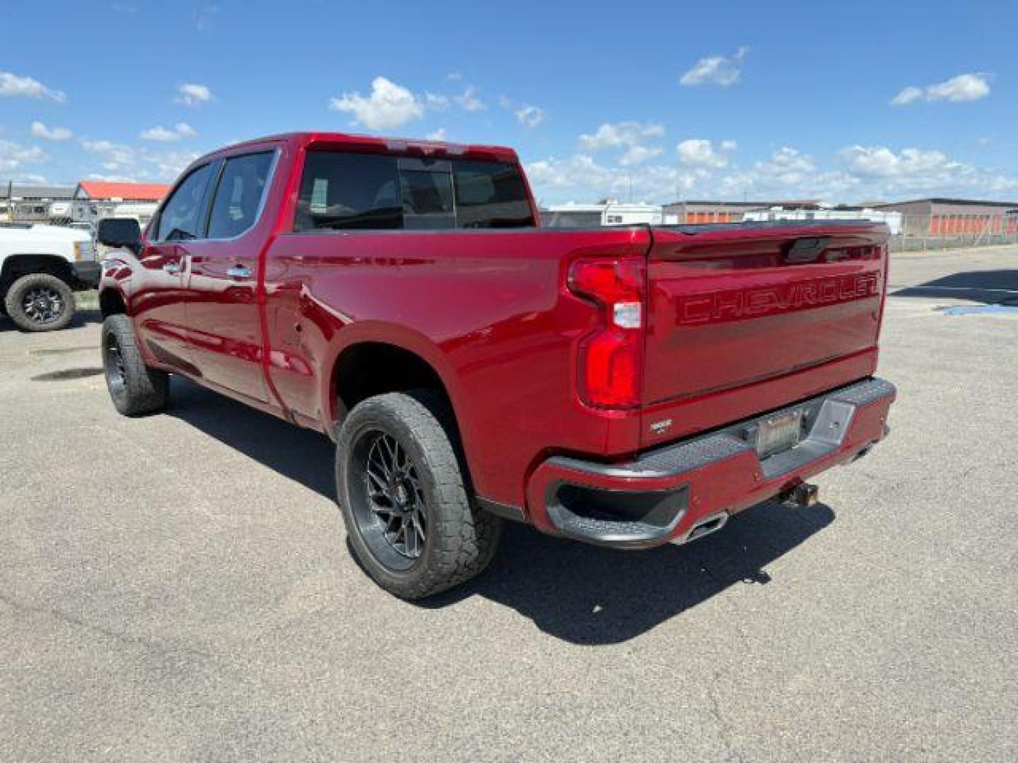 2021 Cherry Red Tintcoat /Jet Black/Umber Chevrolet Silverado 1500 4WD Crew Cab Standard Bed High Country (3GCUYHET6MG) with an Duramax 3L I-6 diesel direct injection engine, AUTOMATIC transmission, located at 1235 N Woodruff Ave., Idaho Falls, 83401, (208) 523-1053, 43.507172, -112.000488 - At Timberline Auto, finding a great deal on your next vehicle is always easy! Our experienced sales staff's goal is to help find you the right vehicle at the right price! Our knowledgeable finance department has options for almost any credit score. We offer extended service contract options to prote - Photo#2