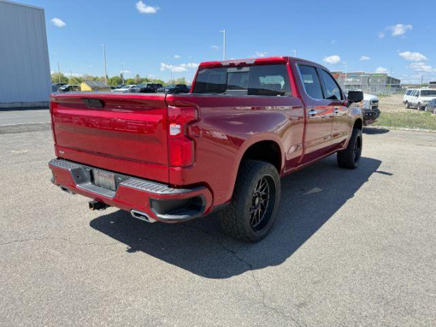 2021 Cherry Red Tintcoat /Jet Black/Umber Chevrolet Silverado 1500 4WD Crew Cab Standard Bed High Country (3GCUYHET6MG) with an Duramax 3L I-6 diesel direct injection engine, AUTOMATIC transmission, located at 1235 N Woodruff Ave., Idaho Falls, 83401, (208) 523-1053, 43.507172, -112.000488 - At Timberline Auto, finding a great deal on your next vehicle is always easy! Our experienced sales staff's goal is to help find you the right vehicle at the right price! Our knowledgeable finance department has options for almost any credit score. We offer extended service contract options to prote - Photo#5