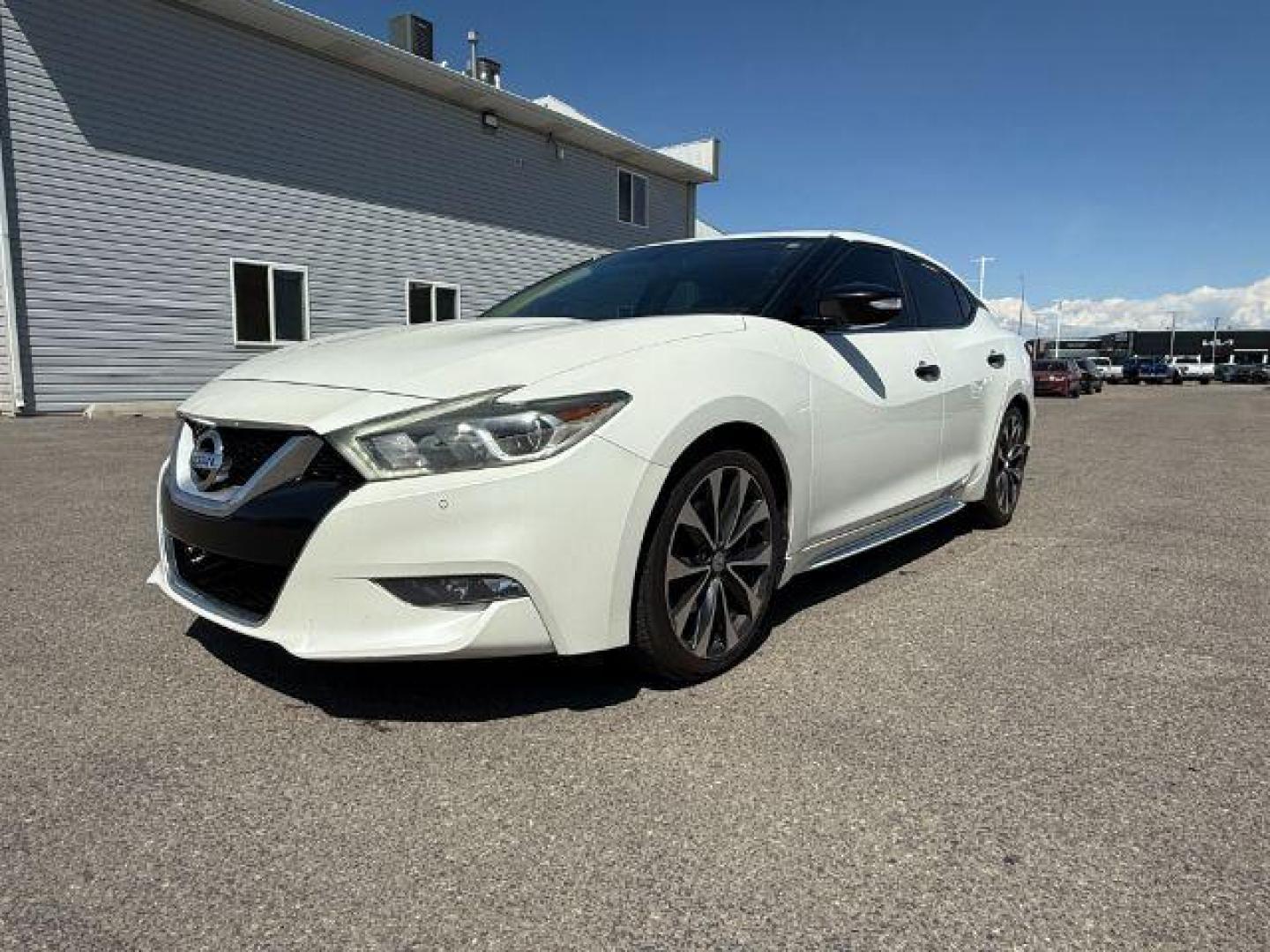 2016 Pearl White /Camel Nissan Maxima 3.5 SR (1N4AA6AP9GC) with an VQ 3.5L V-6 DOHC engine, AUTOMATIC transmission, located at 1235 N Woodruff Ave., Idaho Falls, 83401, (208) 523-1053, 43.507172, -112.000488 - At Timberline Auto, finding a great deal on your next vehicle is always easy! Our experienced sales staff's goal is to help find you the right vehicle at the right price! Our knowledgeable finance department has options for almost any credit score. We offer extended service contract options to prote - Photo#0
