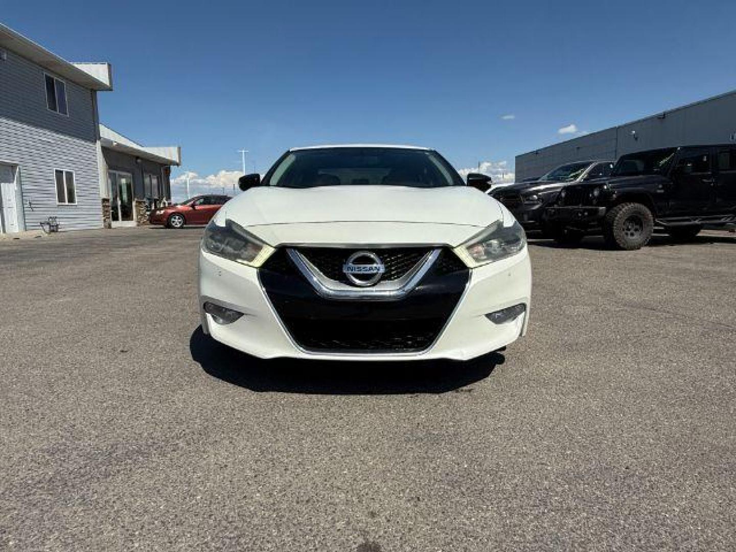 2016 Pearl White /Camel Nissan Maxima 3.5 SR (1N4AA6AP9GC) with an VQ 3.5L V-6 DOHC engine, AUTOMATIC transmission, located at 1235 N Woodruff Ave., Idaho Falls, 83401, (208) 523-1053, 43.507172, -112.000488 - At Timberline Auto, finding a great deal on your next vehicle is always easy! Our experienced sales staff's goal is to help find you the right vehicle at the right price! Our knowledgeable finance department has options for almost any credit score. We offer extended service contract options to prote - Photo#7
