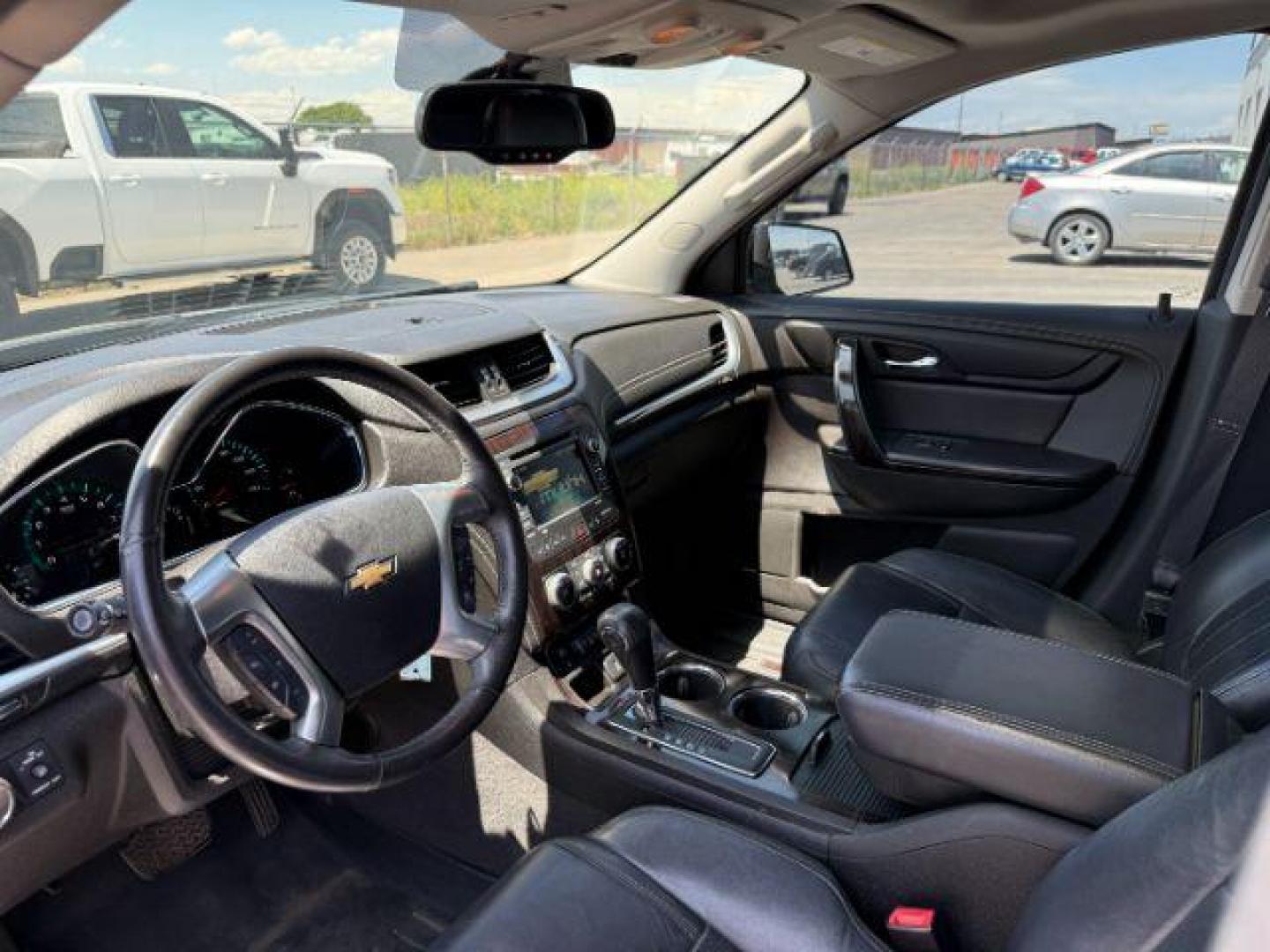2016 Mosaic Black Metallic /Ebony Chevrolet Traverse LTZ (1GNKVJKD9GJ) with an 3.6L V-6 gasoline direct injection engine, AUTOMATIC transmission, located at 1235 N Woodruff Ave., Idaho Falls, 83401, (208) 523-1053, 43.507172, -112.000488 - At Timberline Auto, finding a great deal on your next vehicle is always easy! Our experienced sales staff's goal is to help find you the right vehicle at the right price! Our knowledgeable finance department has options for almost any credit score. We offer extended service contract options to prote - Photo#38