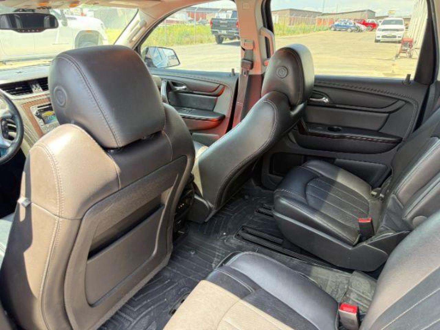 2016 Mosaic Black Metallic /Ebony Chevrolet Traverse LTZ (1GNKVJKD9GJ) with an 3.6L V-6 gasoline direct injection engine, AUTOMATIC transmission, located at 1235 N Woodruff Ave., Idaho Falls, 83401, (208) 523-1053, 43.507172, -112.000488 - At Timberline Auto, finding a great deal on your next vehicle is always easy! Our experienced sales staff's goal is to help find you the right vehicle at the right price! Our knowledgeable finance department has options for almost any credit score. We offer extended service contract options to prote - Photo#48