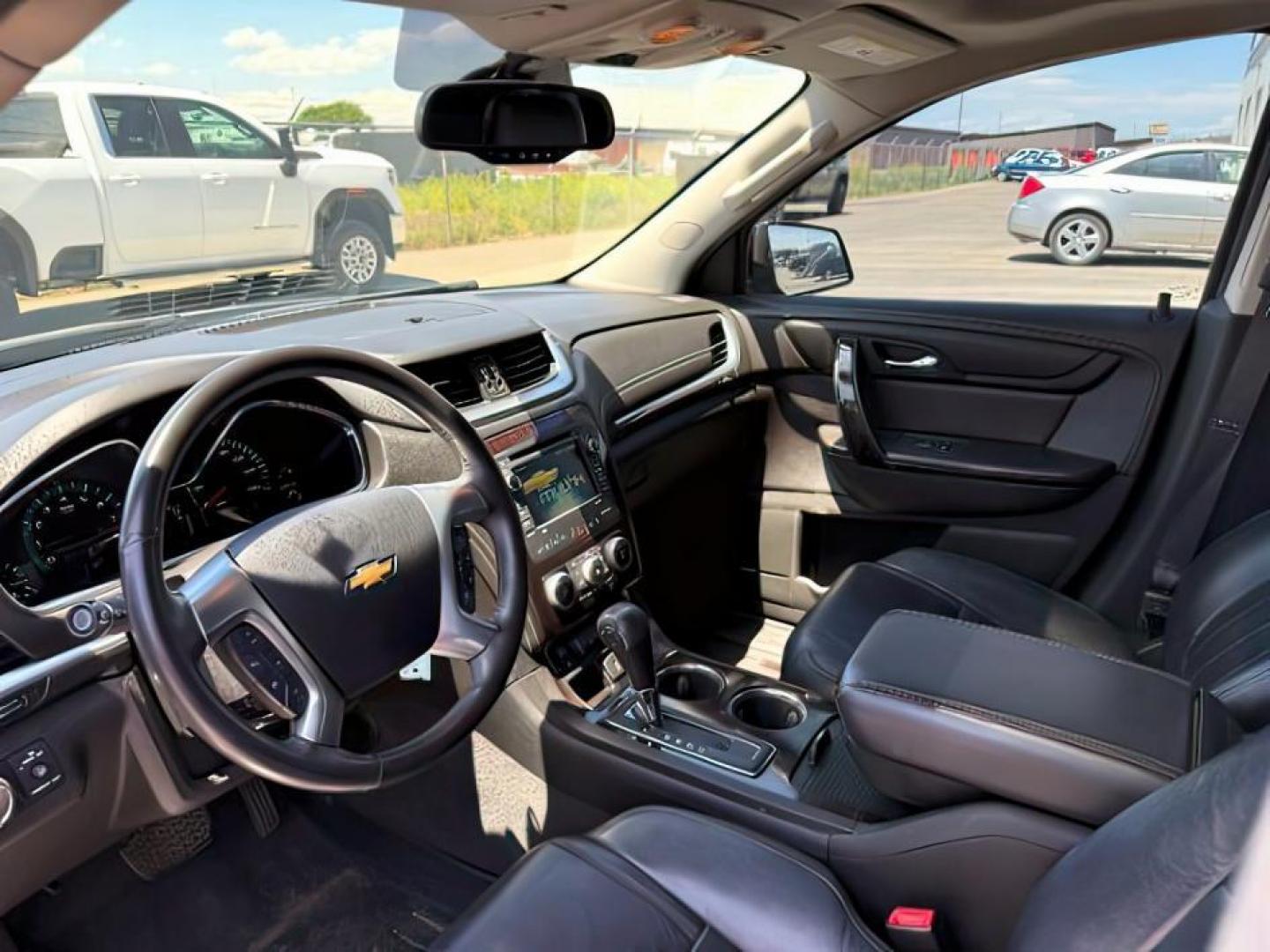 2016 Mosaic Black Metallic /Ebony Chevrolet Traverse LTZ (1GNKVJKD9GJ) with an 3.6L V-6 gasoline direct injection engine, AUTOMATIC transmission, located at 1235 N Woodruff Ave., Idaho Falls, 83401, (208) 523-1053, 43.507172, -112.000488 - At Timberline Auto, finding a great deal on your next vehicle is always easy! Our experienced sales staff's goal is to help find you the right vehicle at the right price! Our knowledgeable finance department has options for almost any credit score. We offer extended service contract options to prote - Photo#13